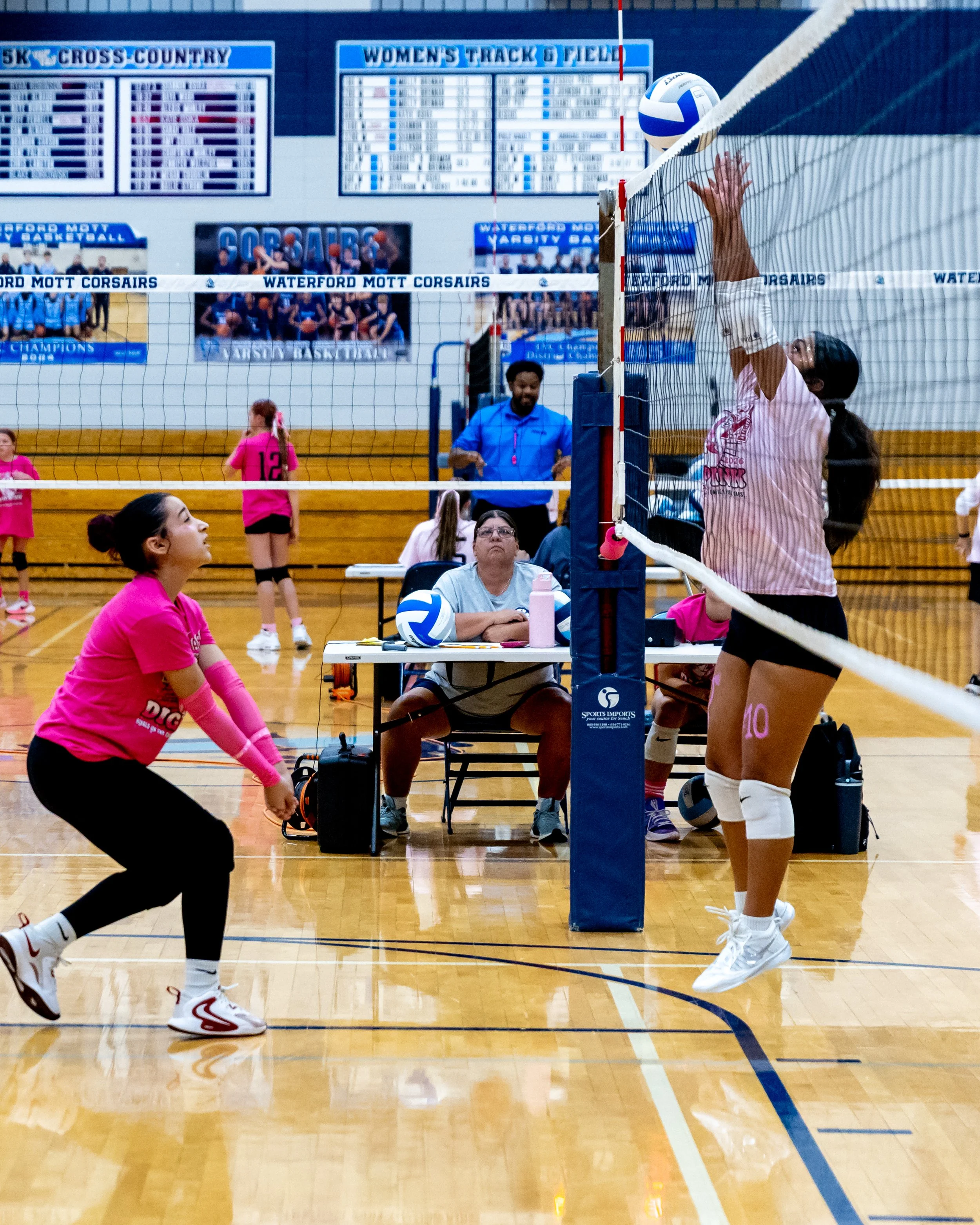 Mason player hits the ball