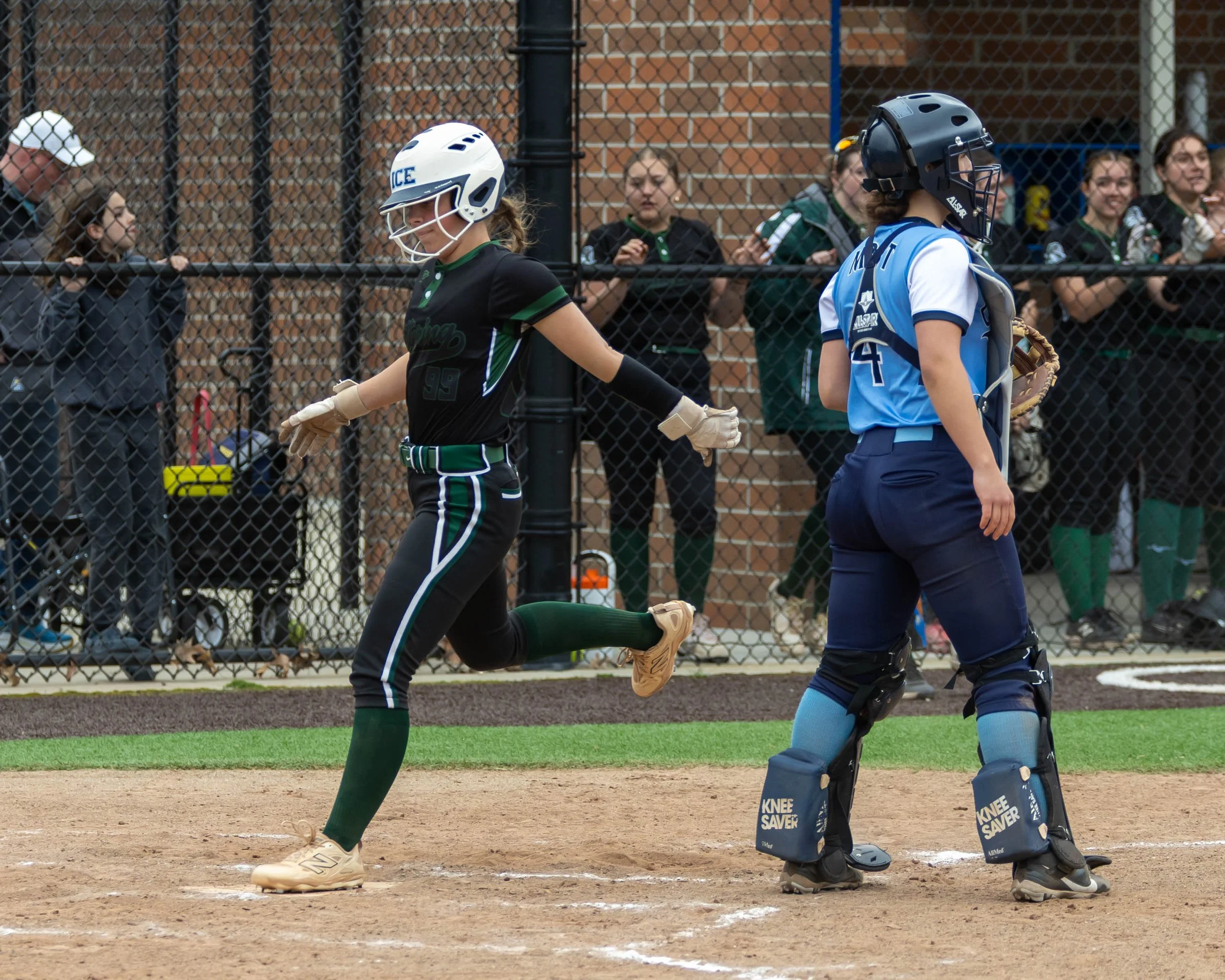 Kettering runner cross homeplate 
