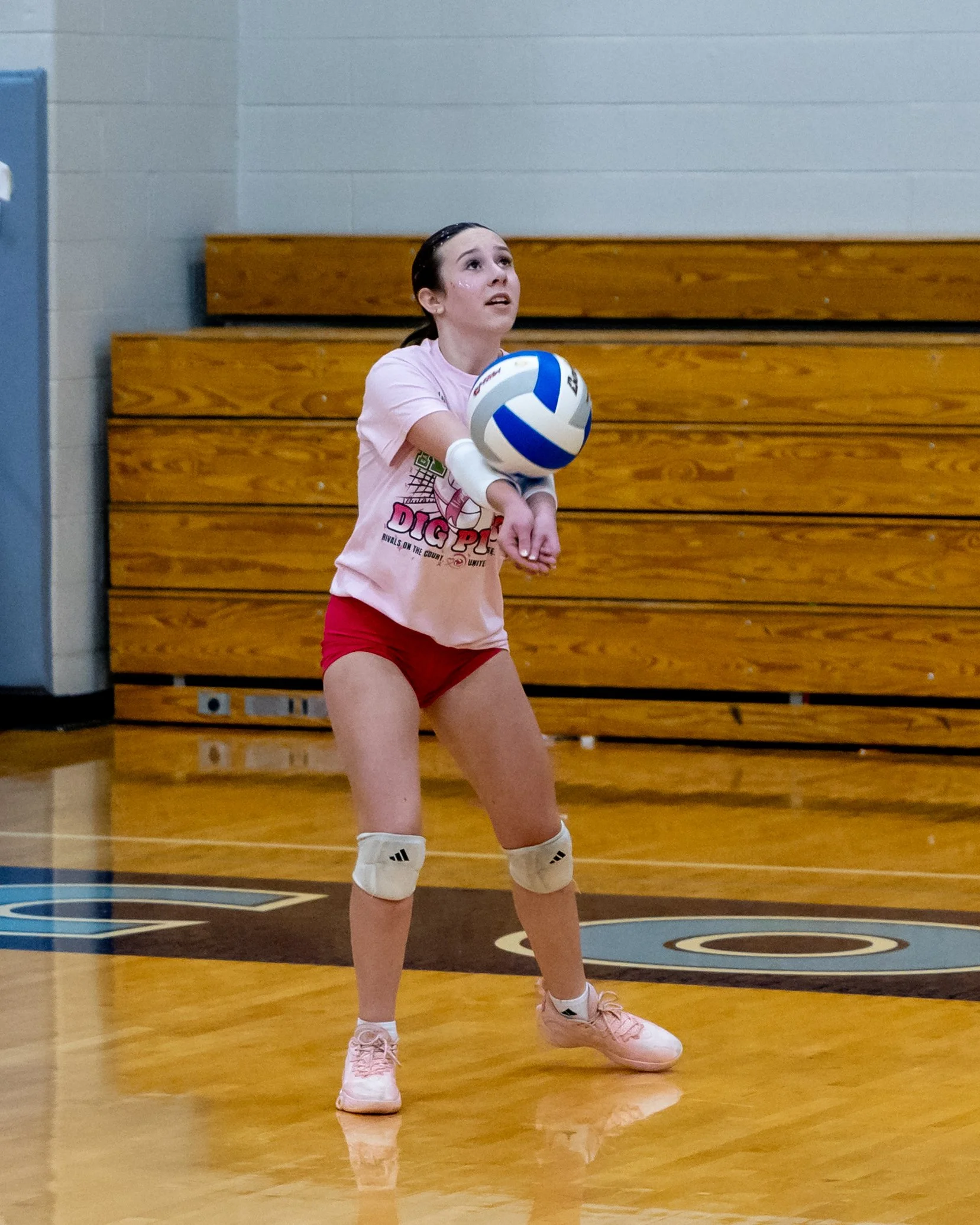 Kettering player hits the ball