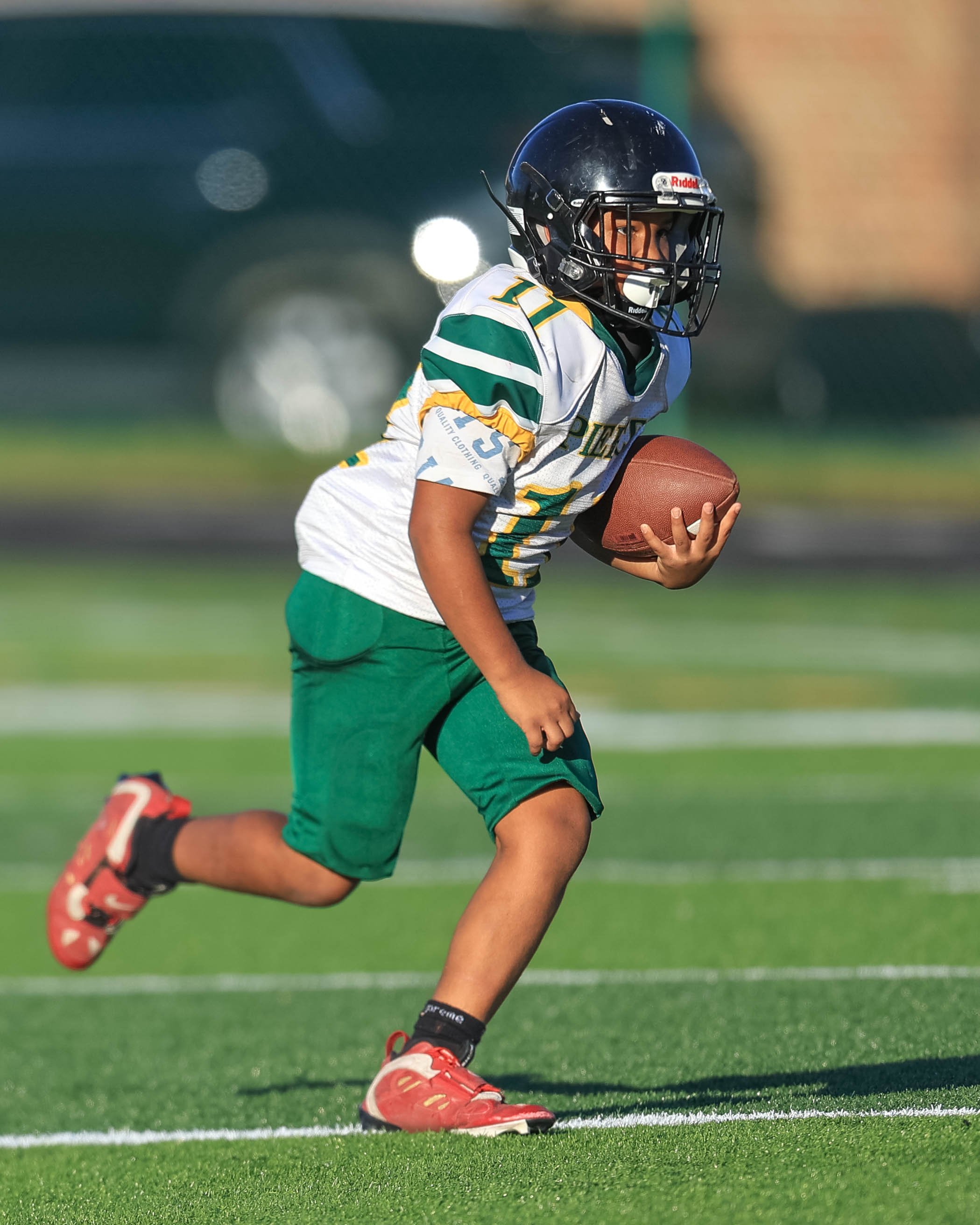 Pierce #11 runs the with ball