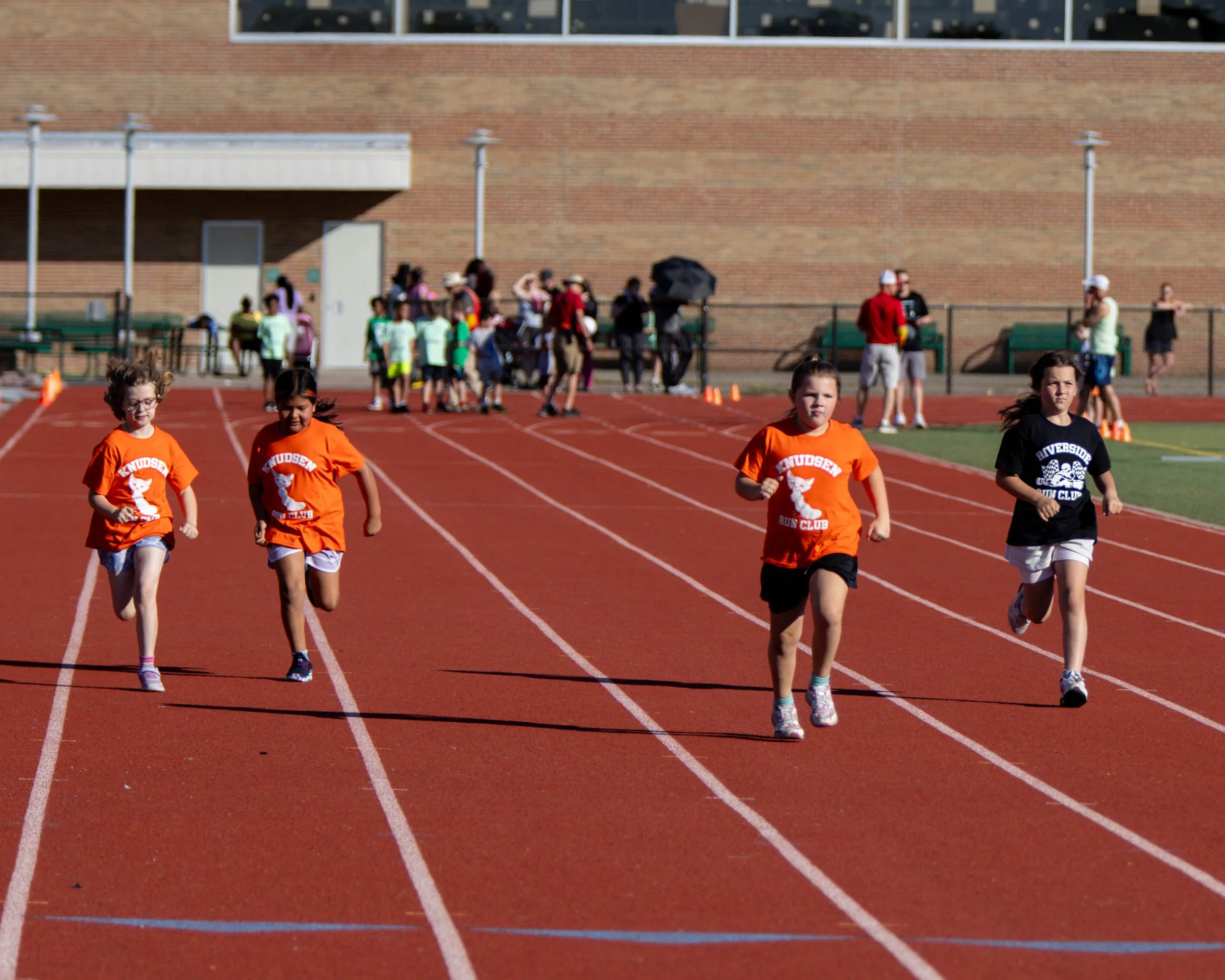 Knudsen and Riverside girls finish the race