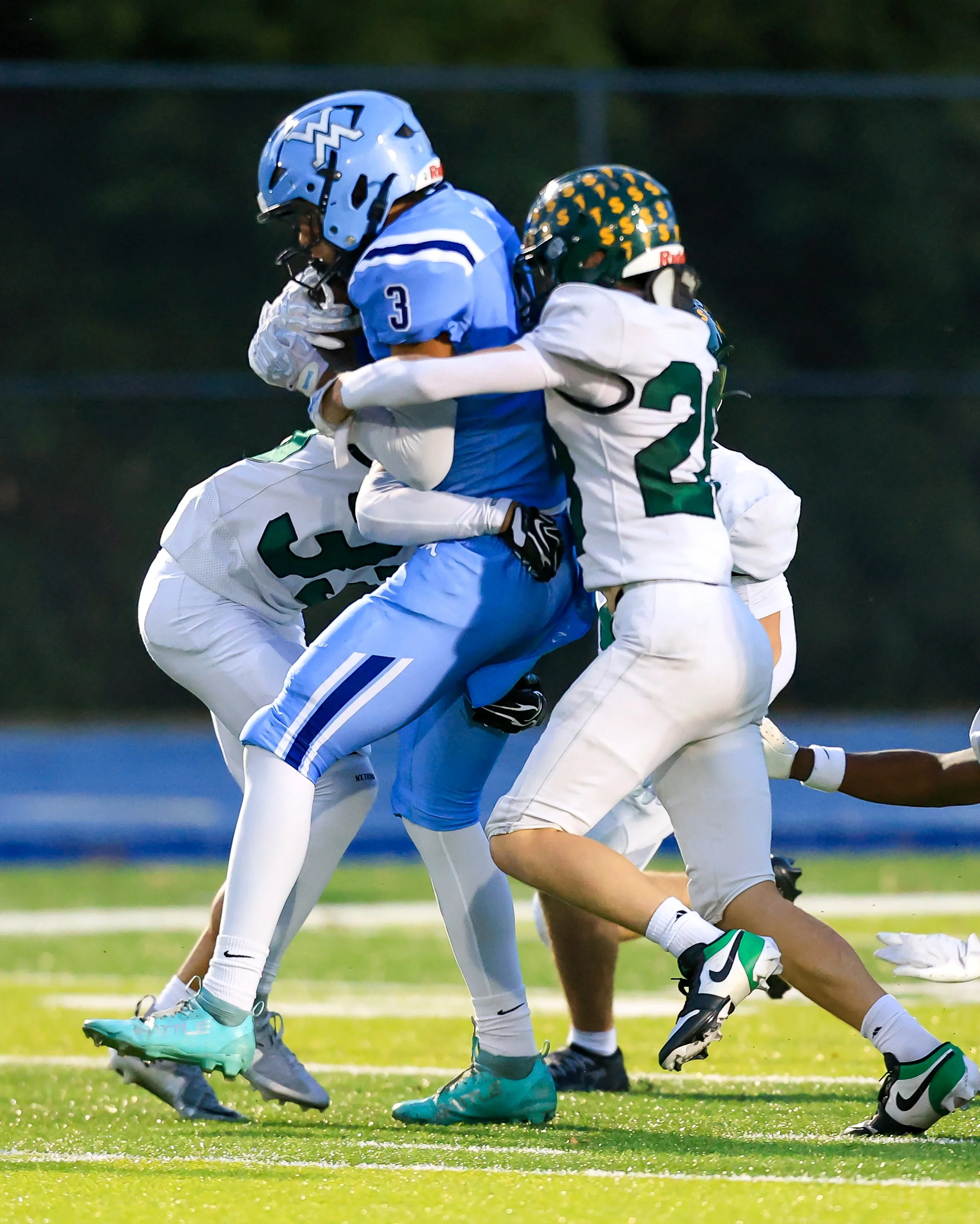Mott #3 running with the ball 