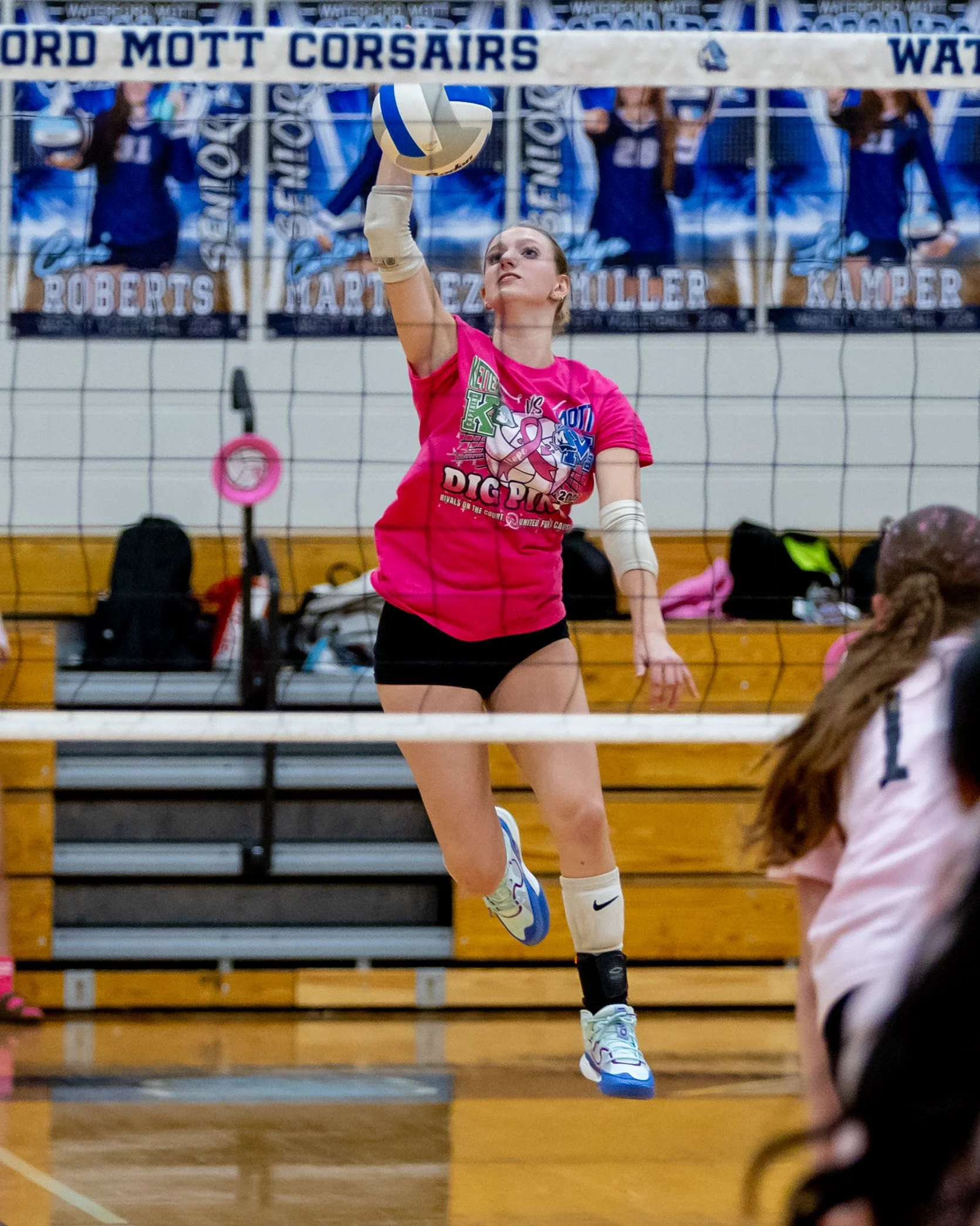 Kettering player hits the ball
