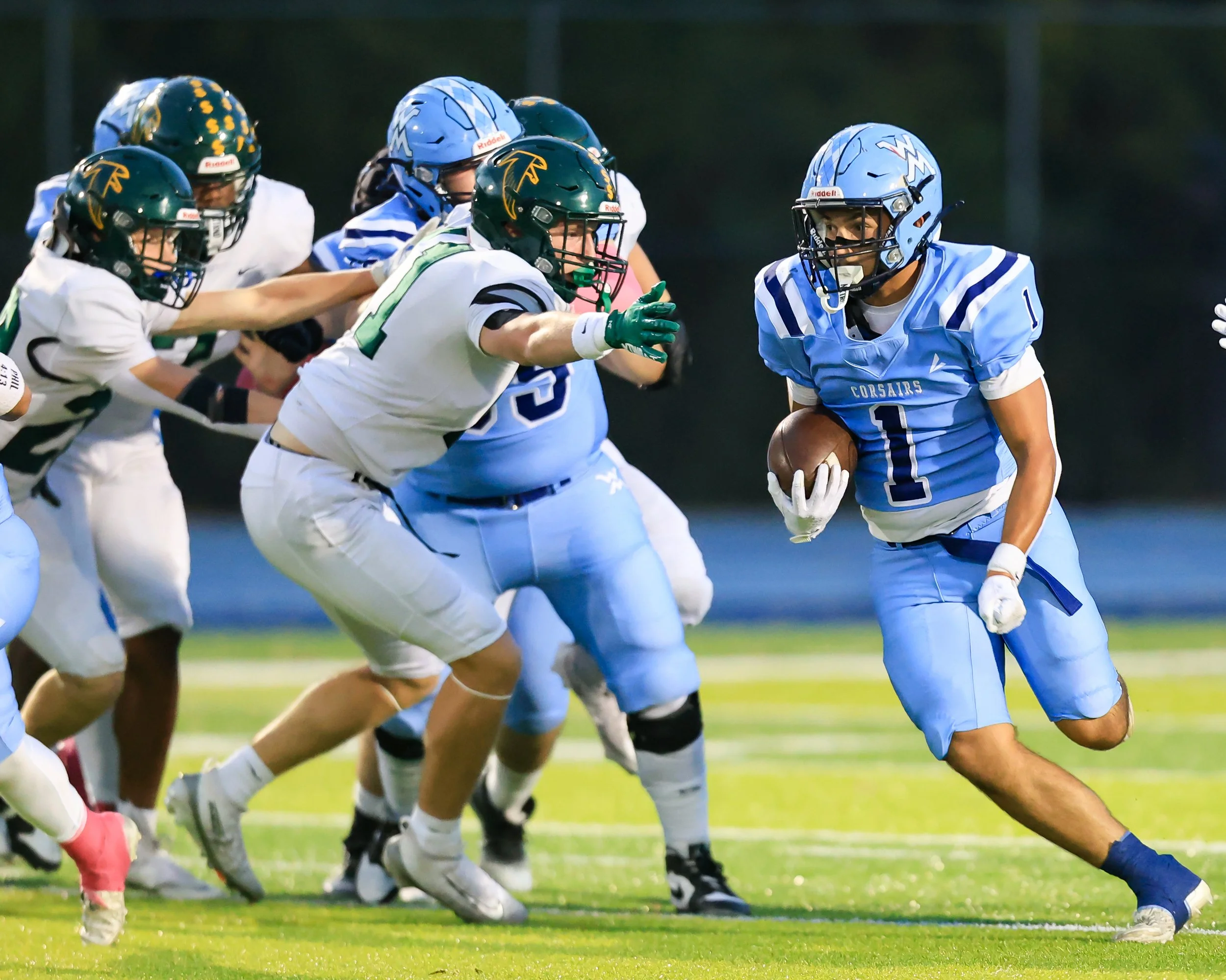 Mott #1 running with the ball