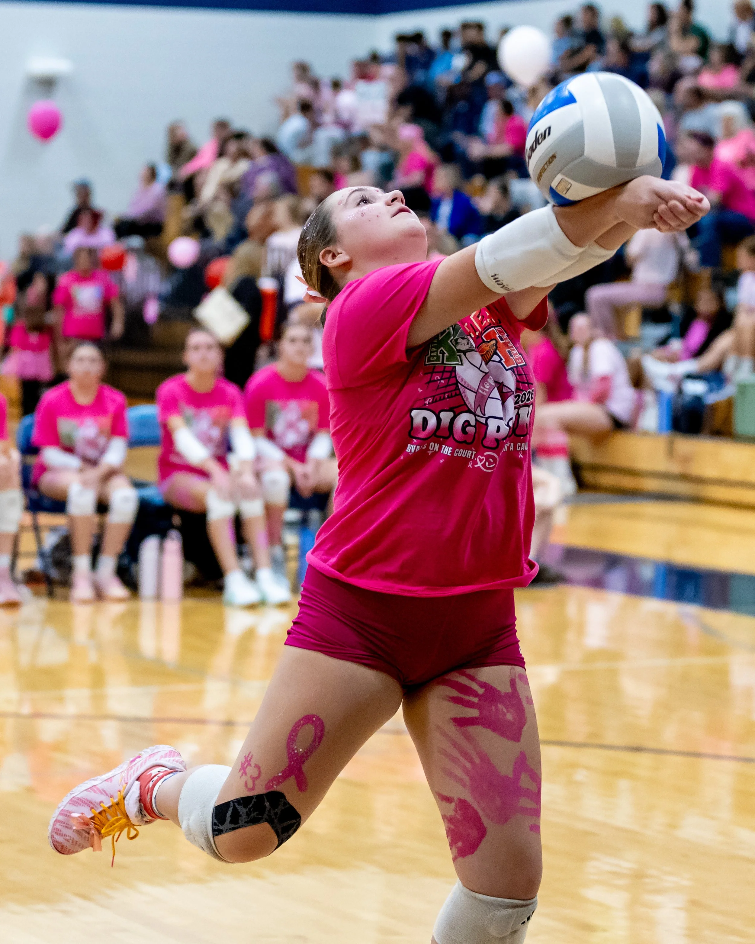 Kettering player hits the ball