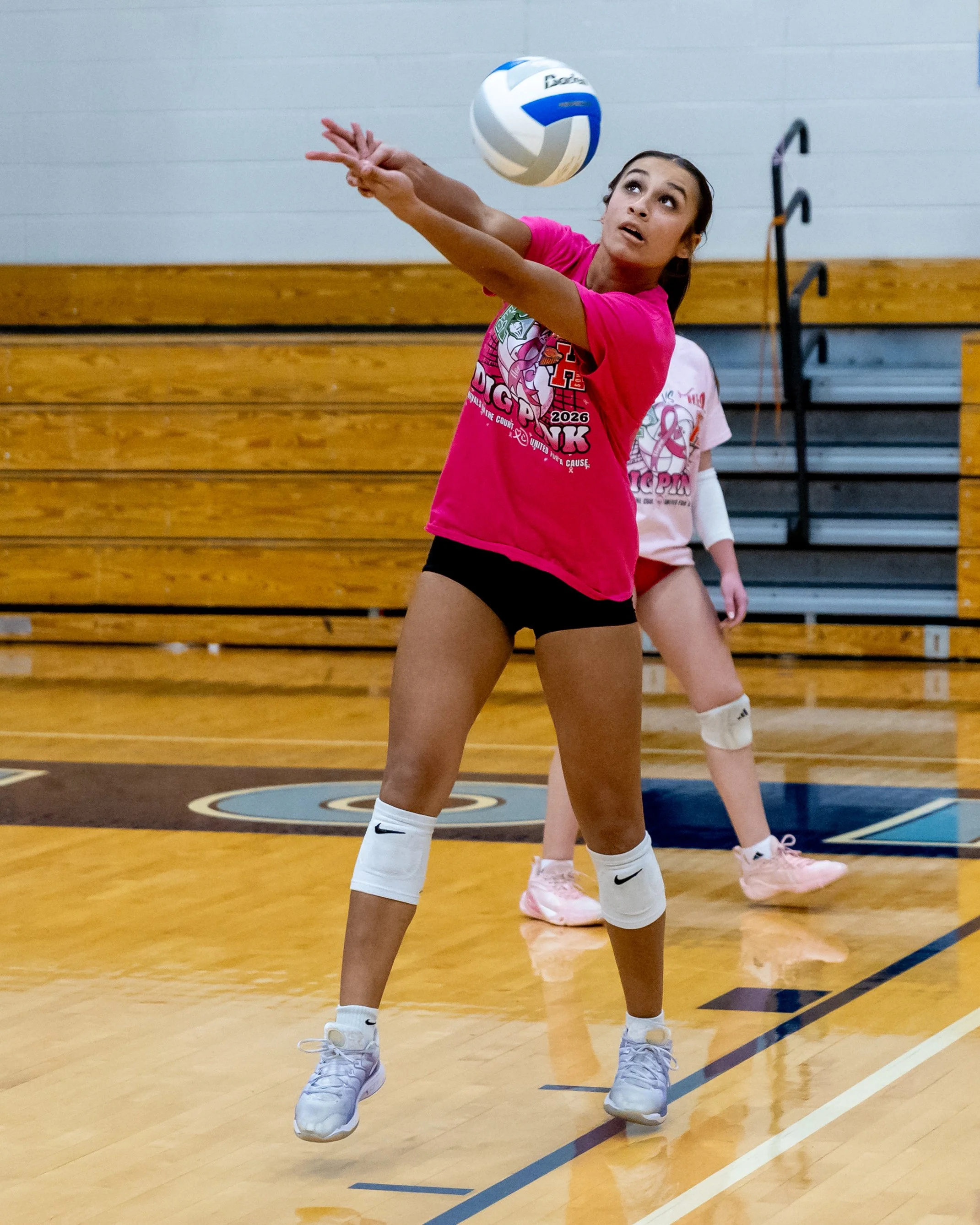 Kettering player hits the ball