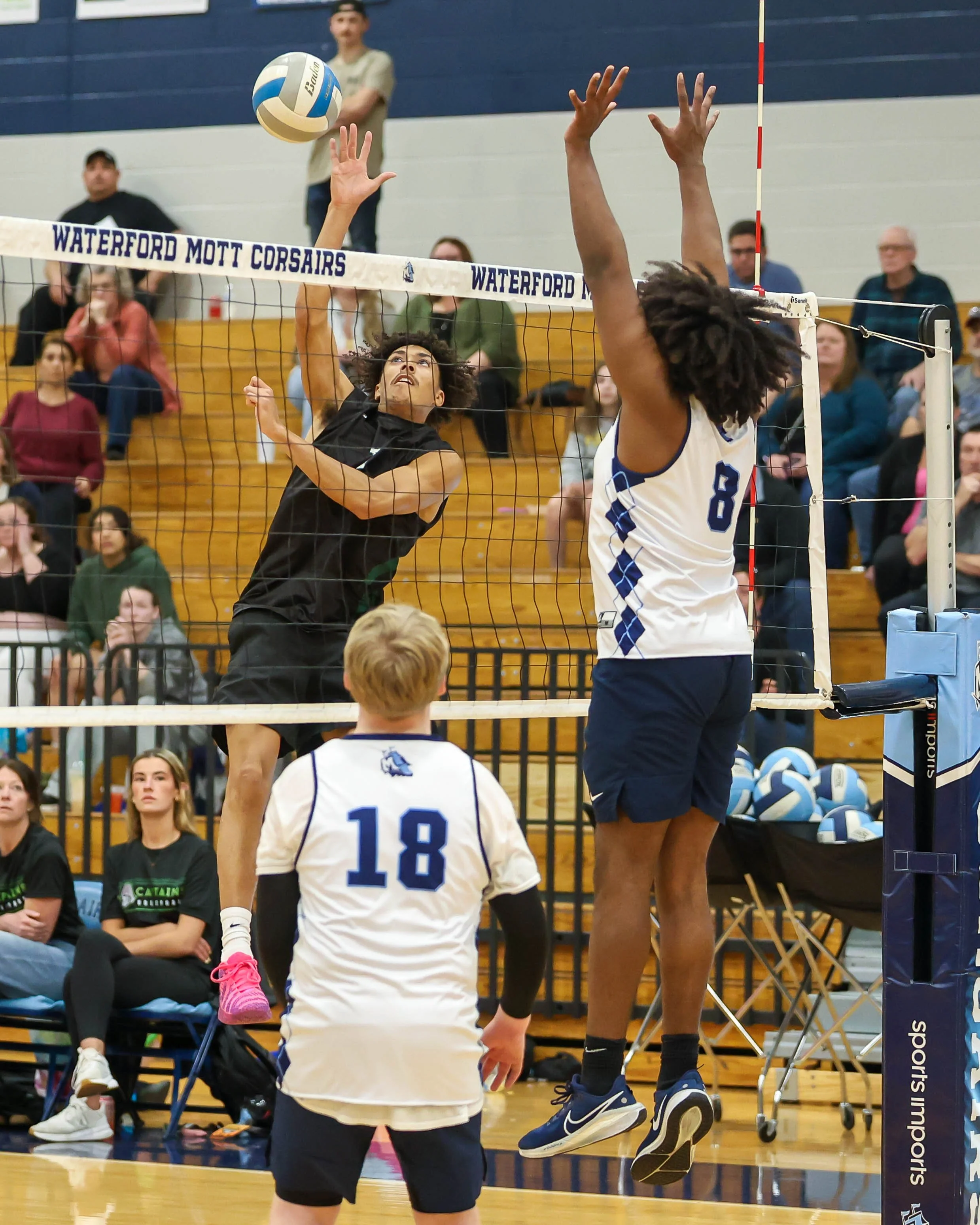 Mott #1 spikes the ball