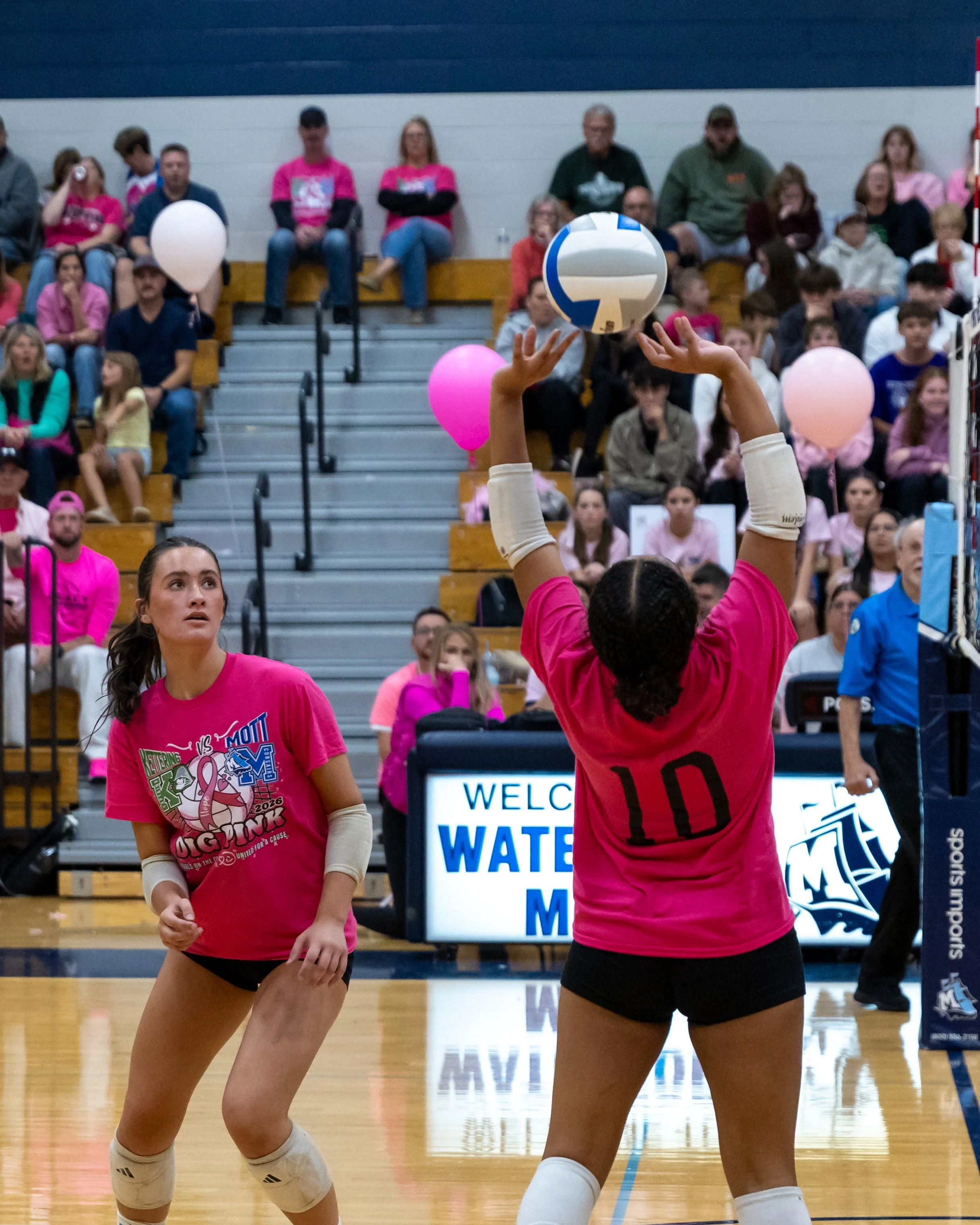 Kettering player sets the ball