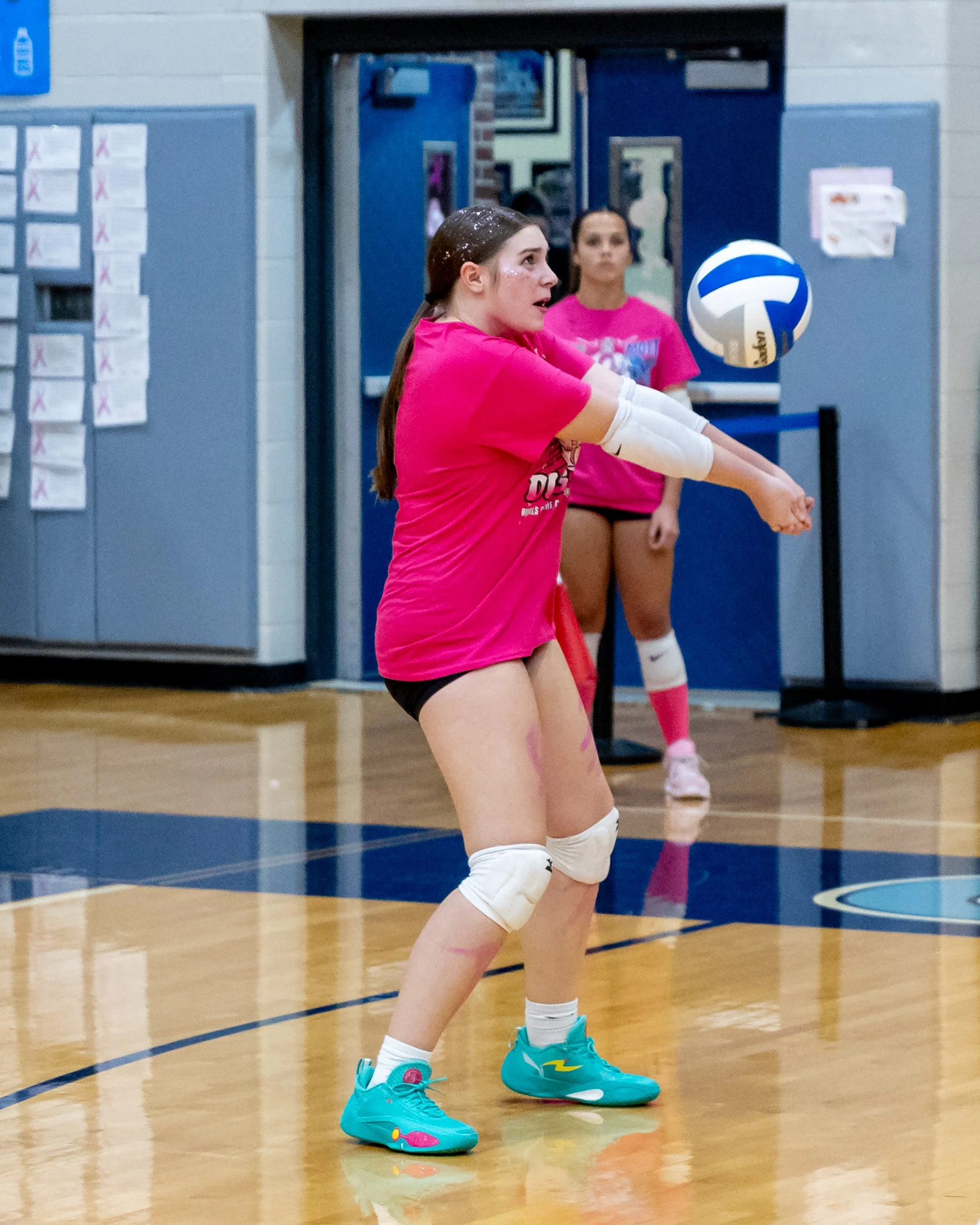Kettering player hits the ball