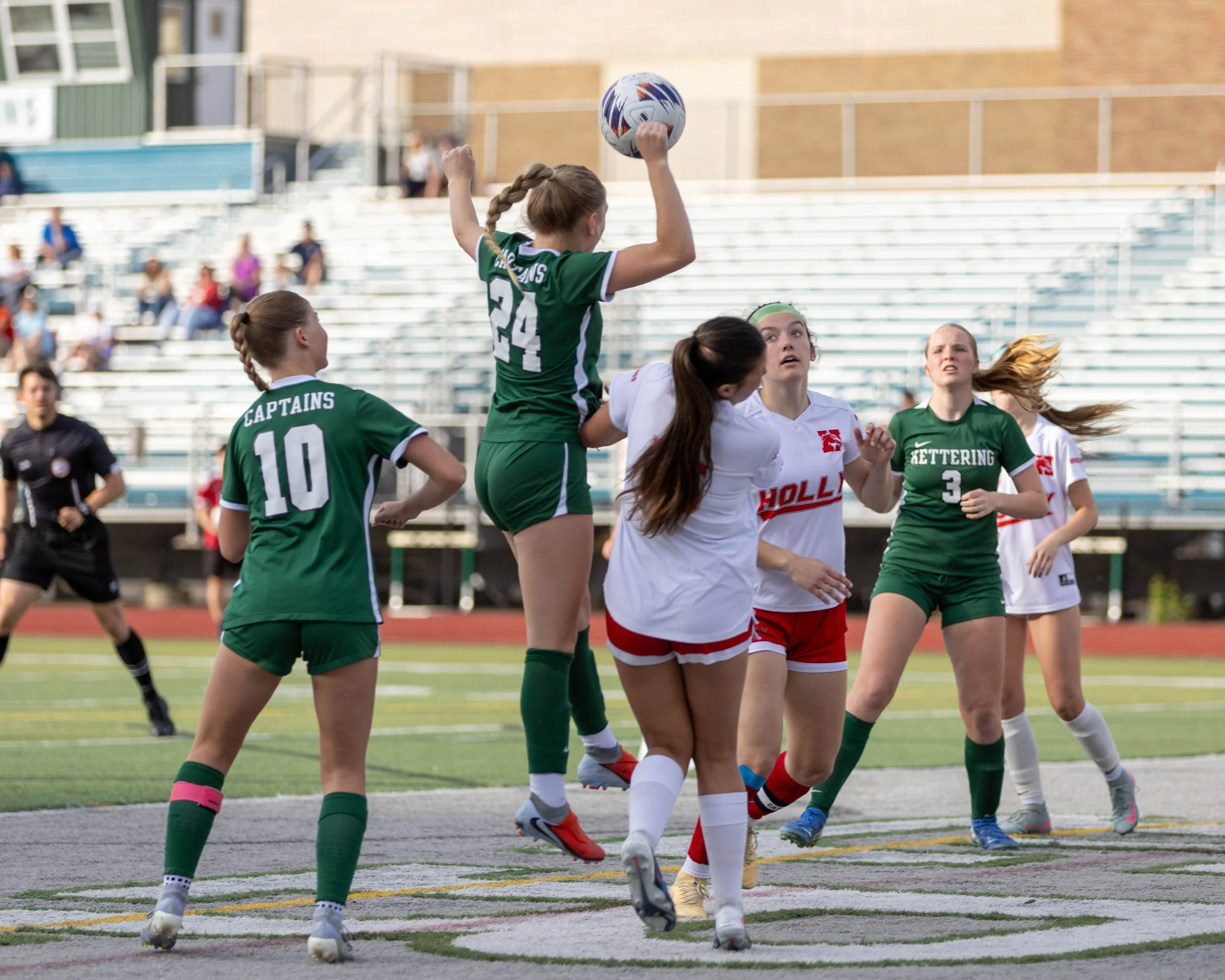 #24 heads the ball into the net