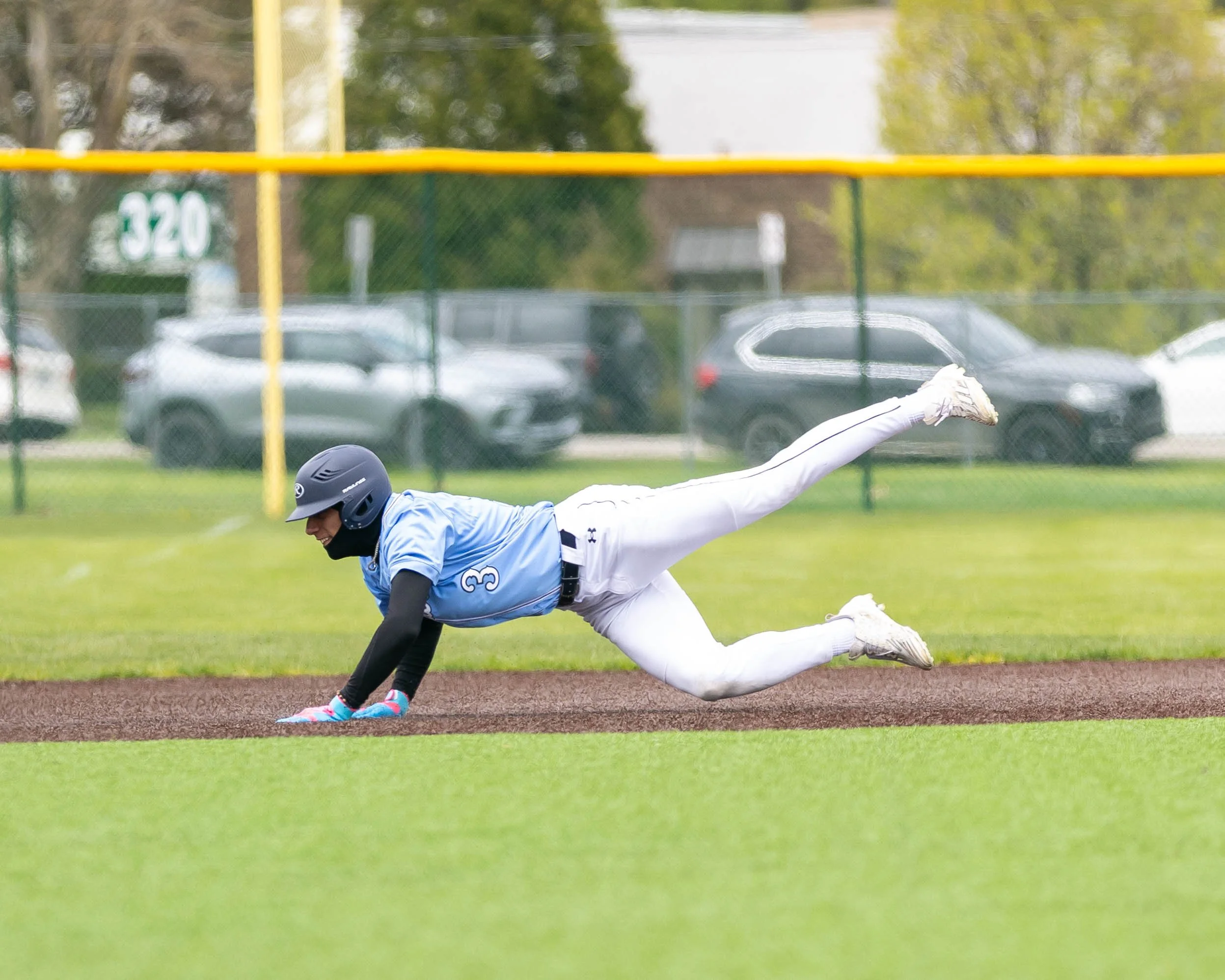 Mott #3 slides into 3rd base