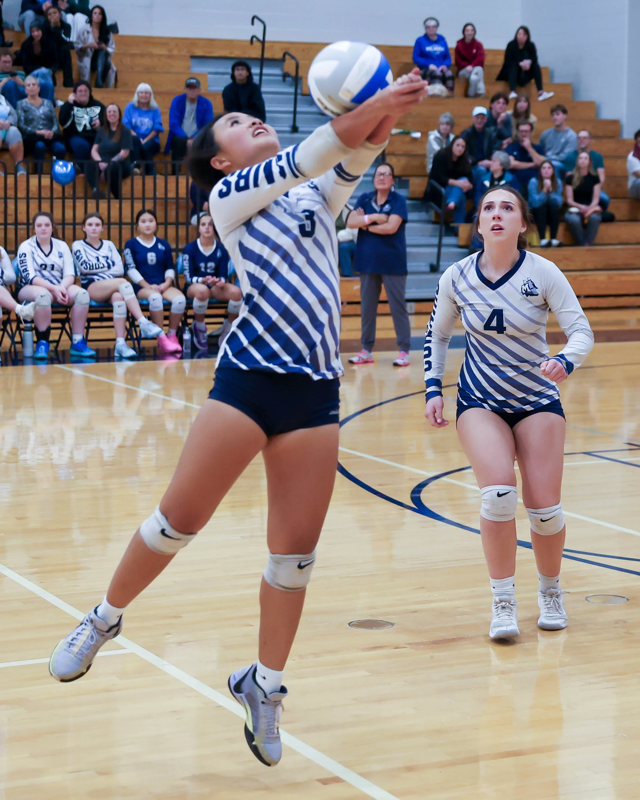 Mott #3 returns the ball
