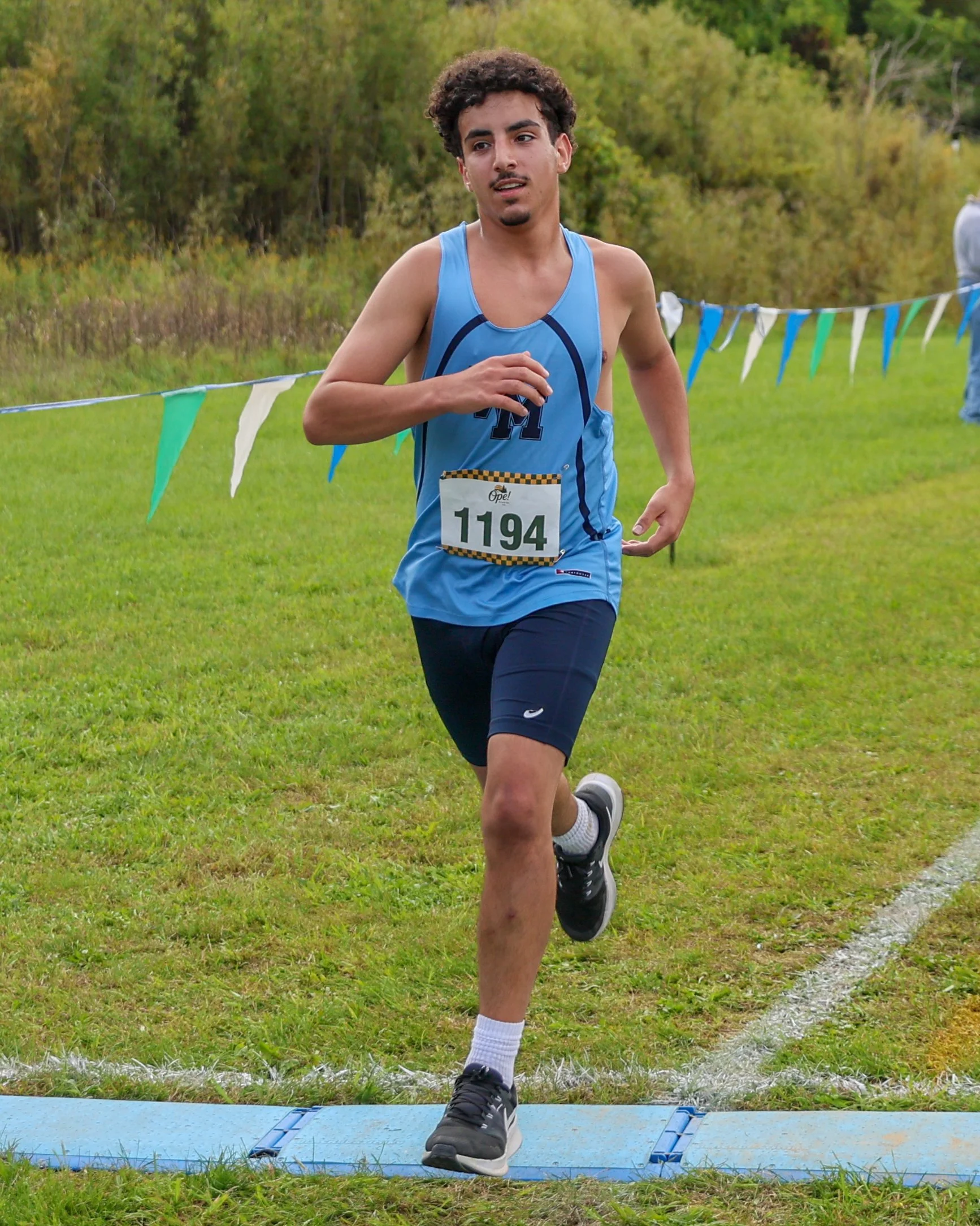 WM runner at the finish line