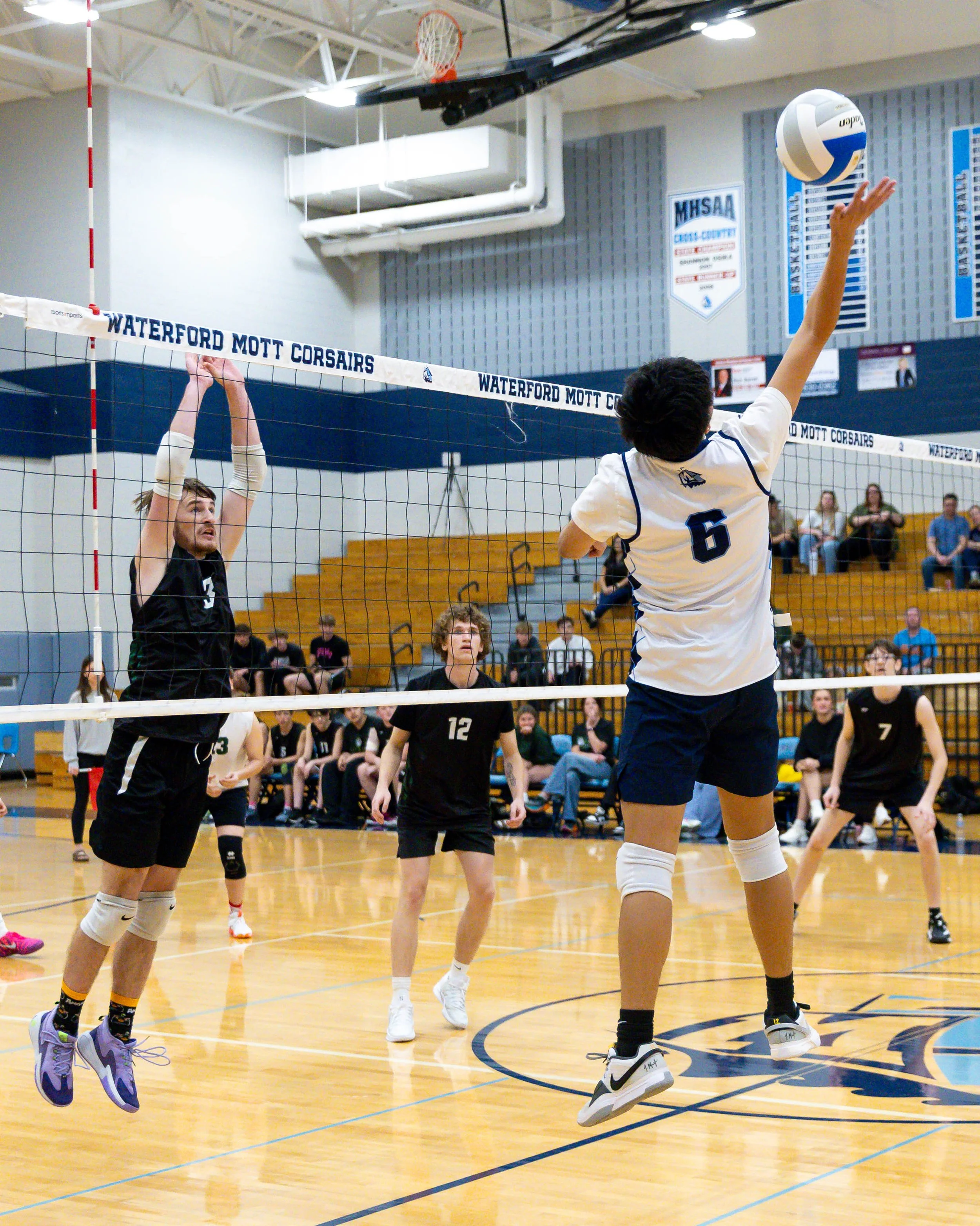 Mott #8 returns the ball