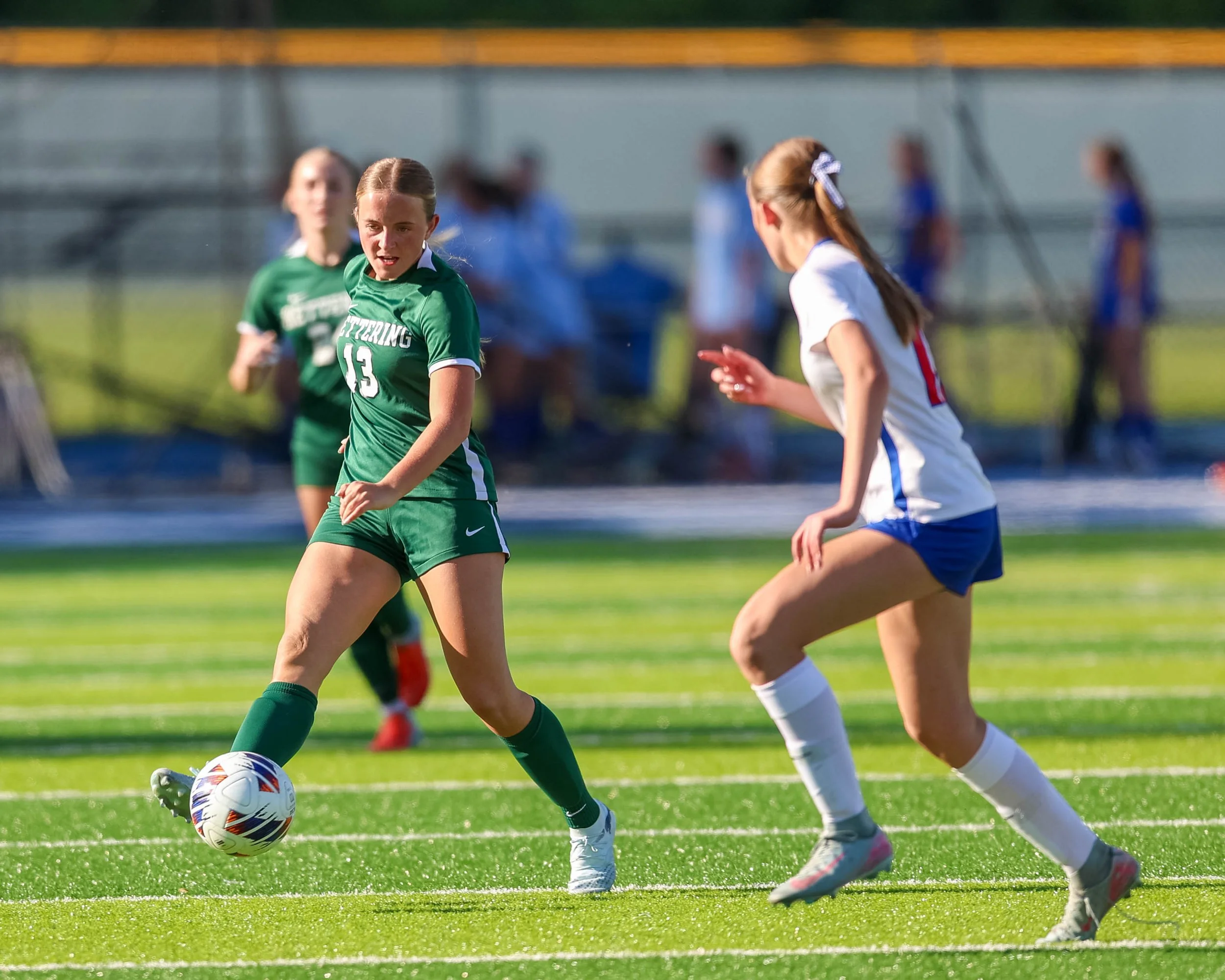 #13 passes the ball