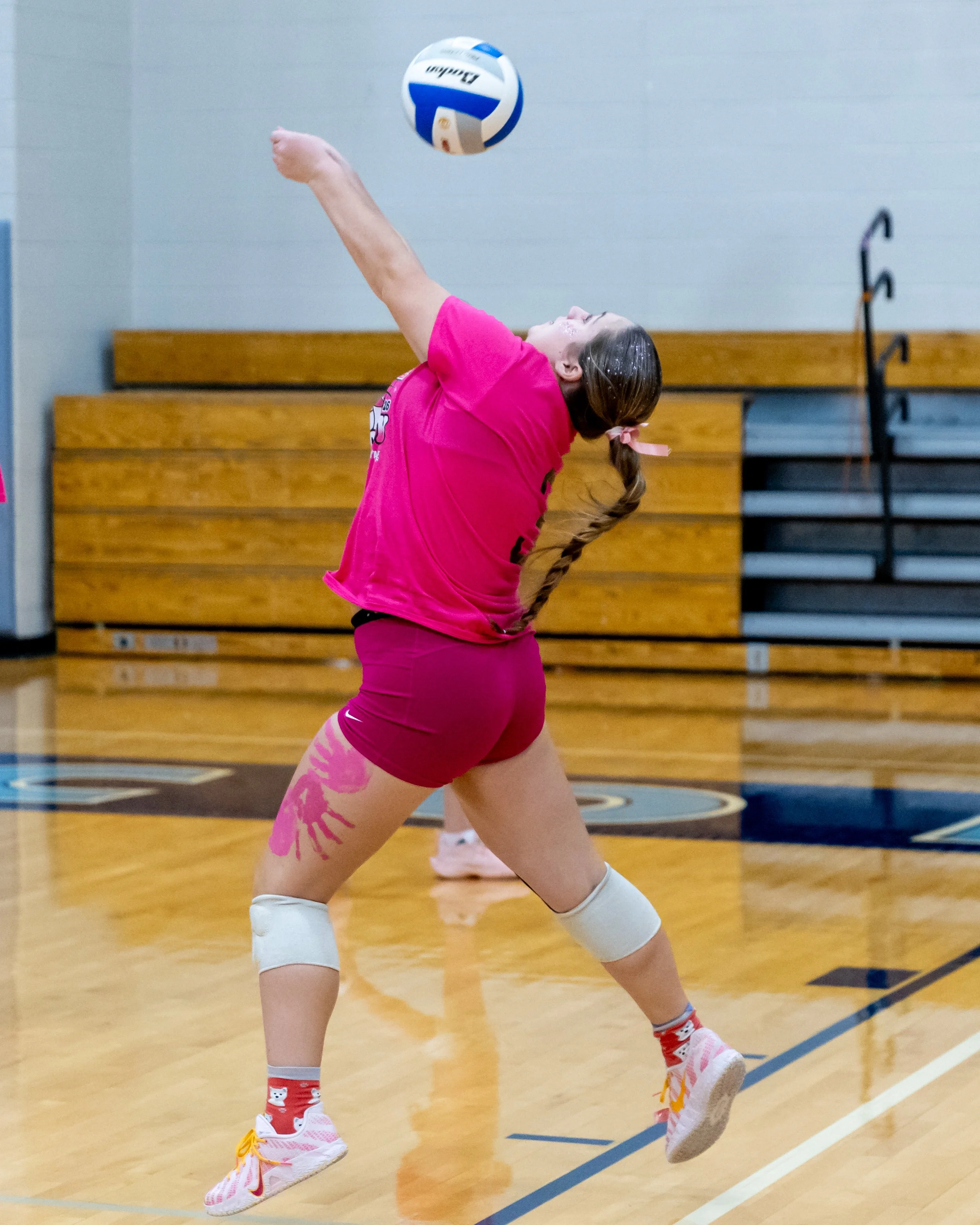 Kettering player hits the ball