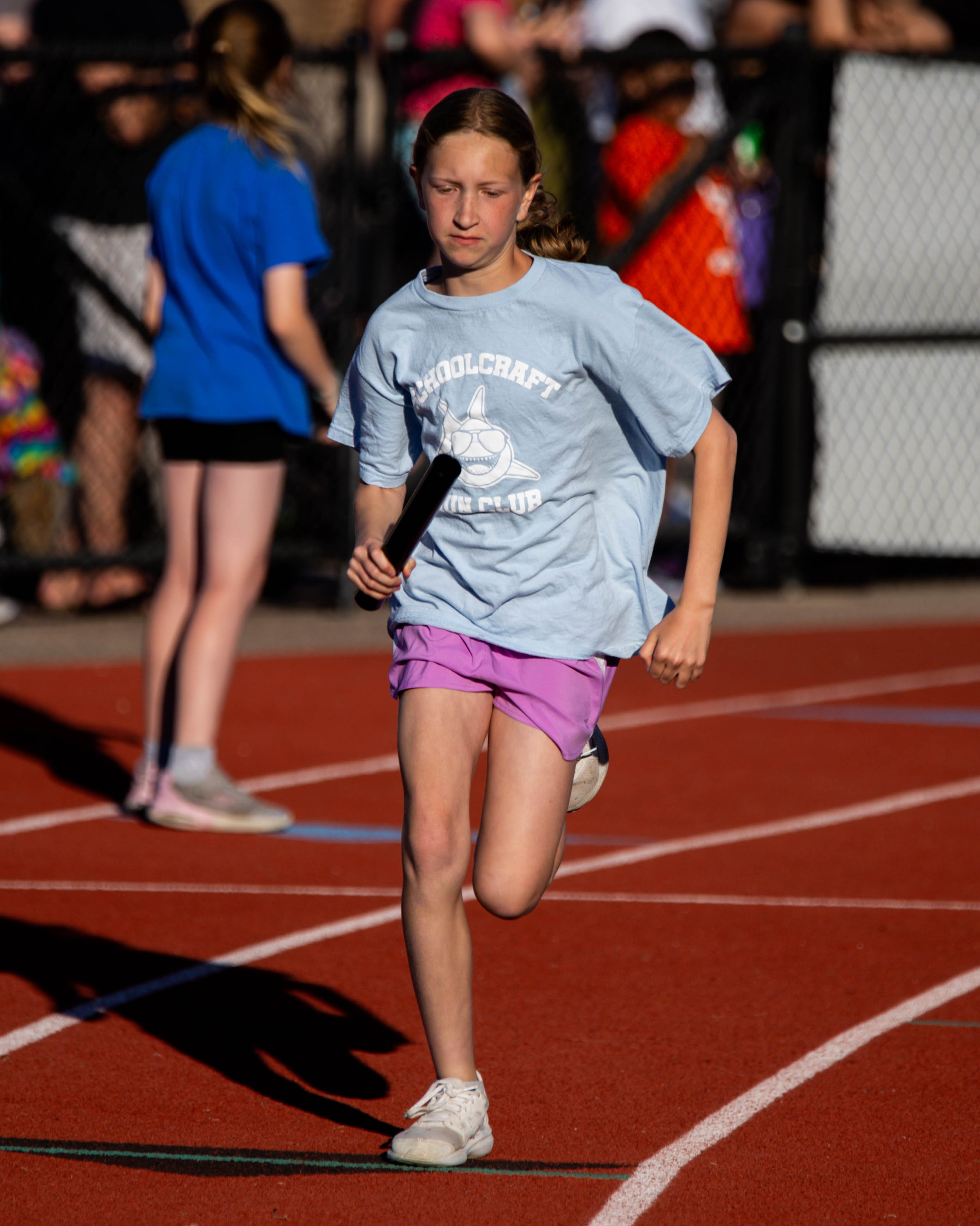 Schoolcraft runner after the exchange