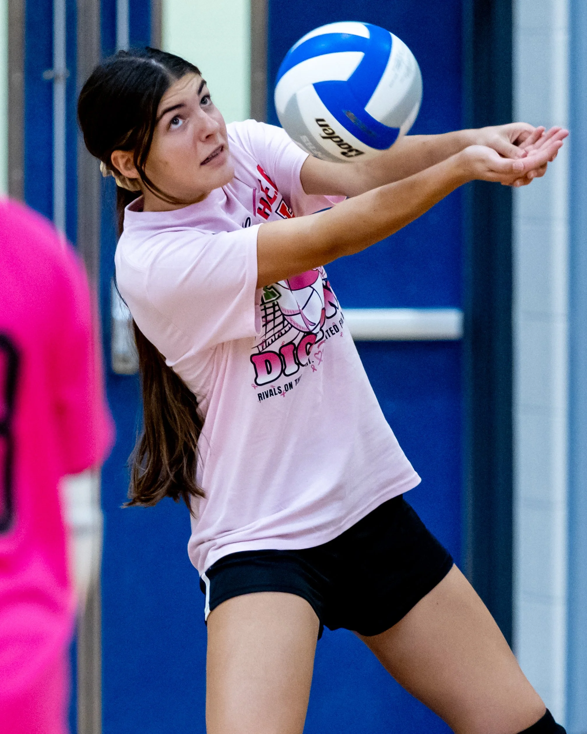 Firebird player hits the ball