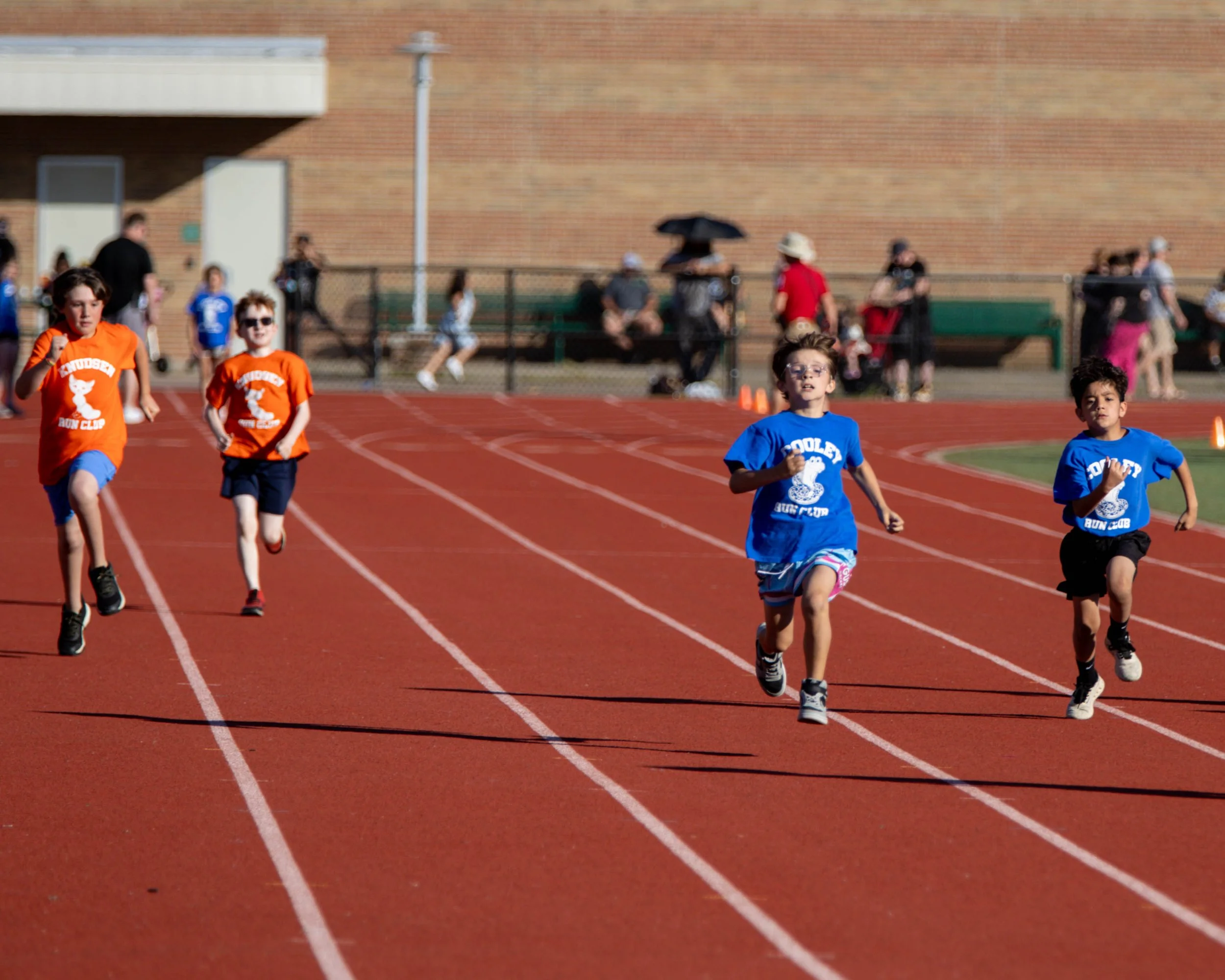 Knudsen and Cooley boys on the track