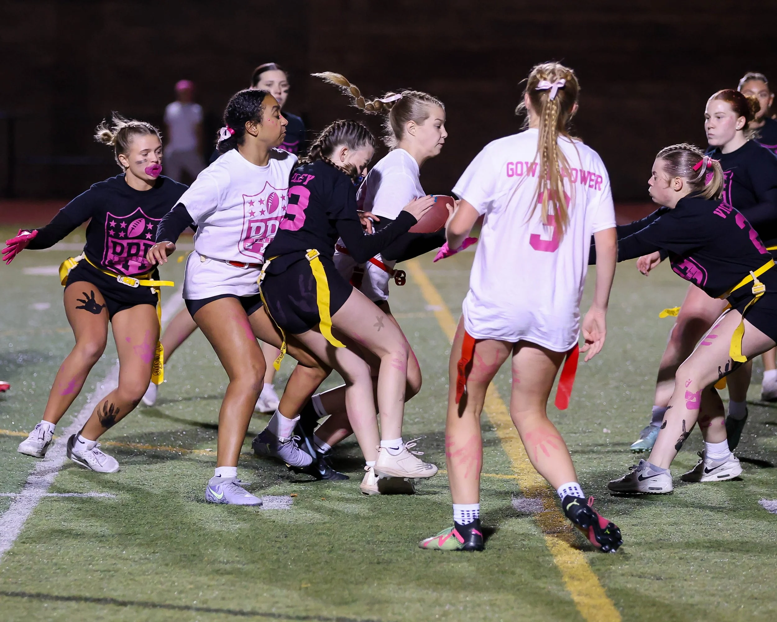 Junior quarterback runs through the middle of the defense