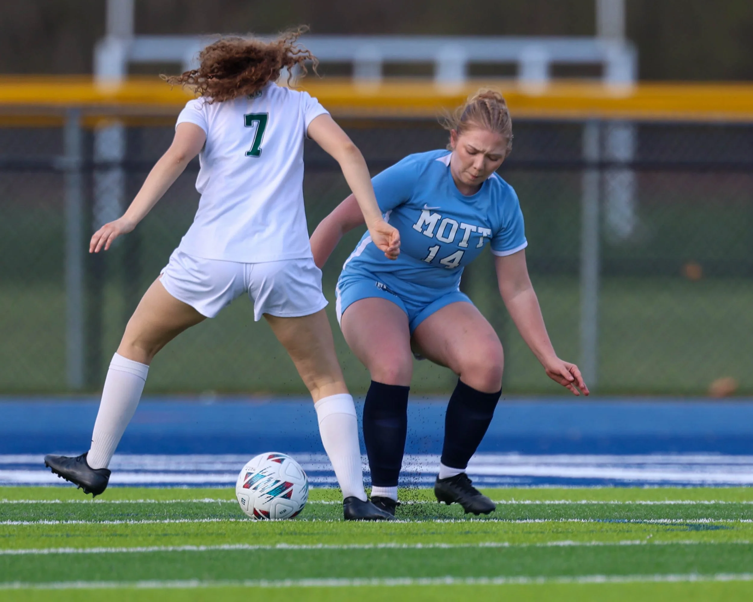 #14 tries to steal the ball