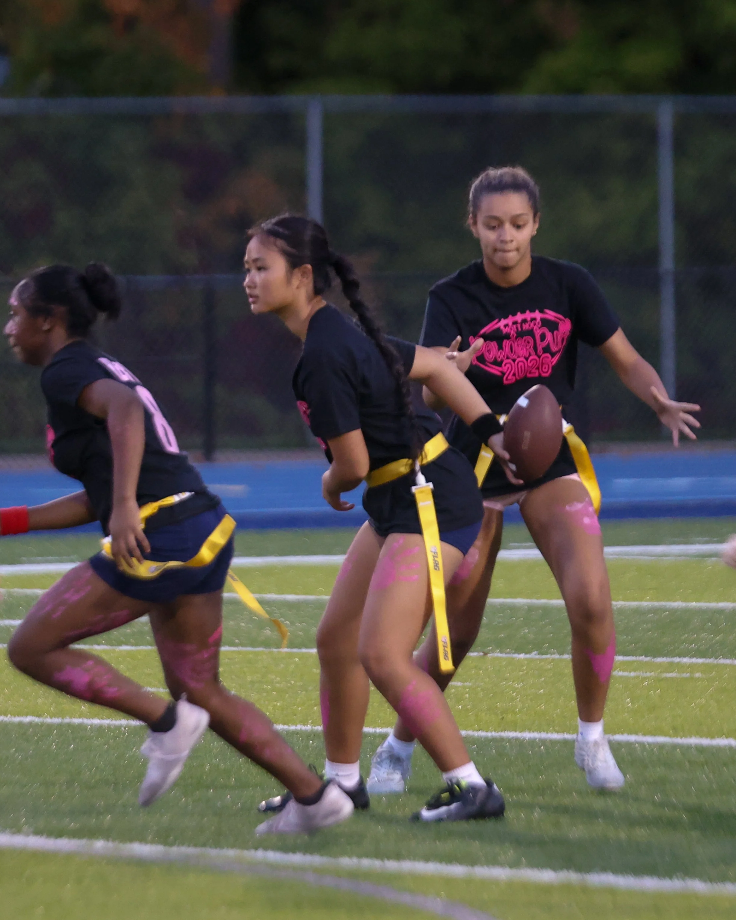 WM Senior QB hands the ball off