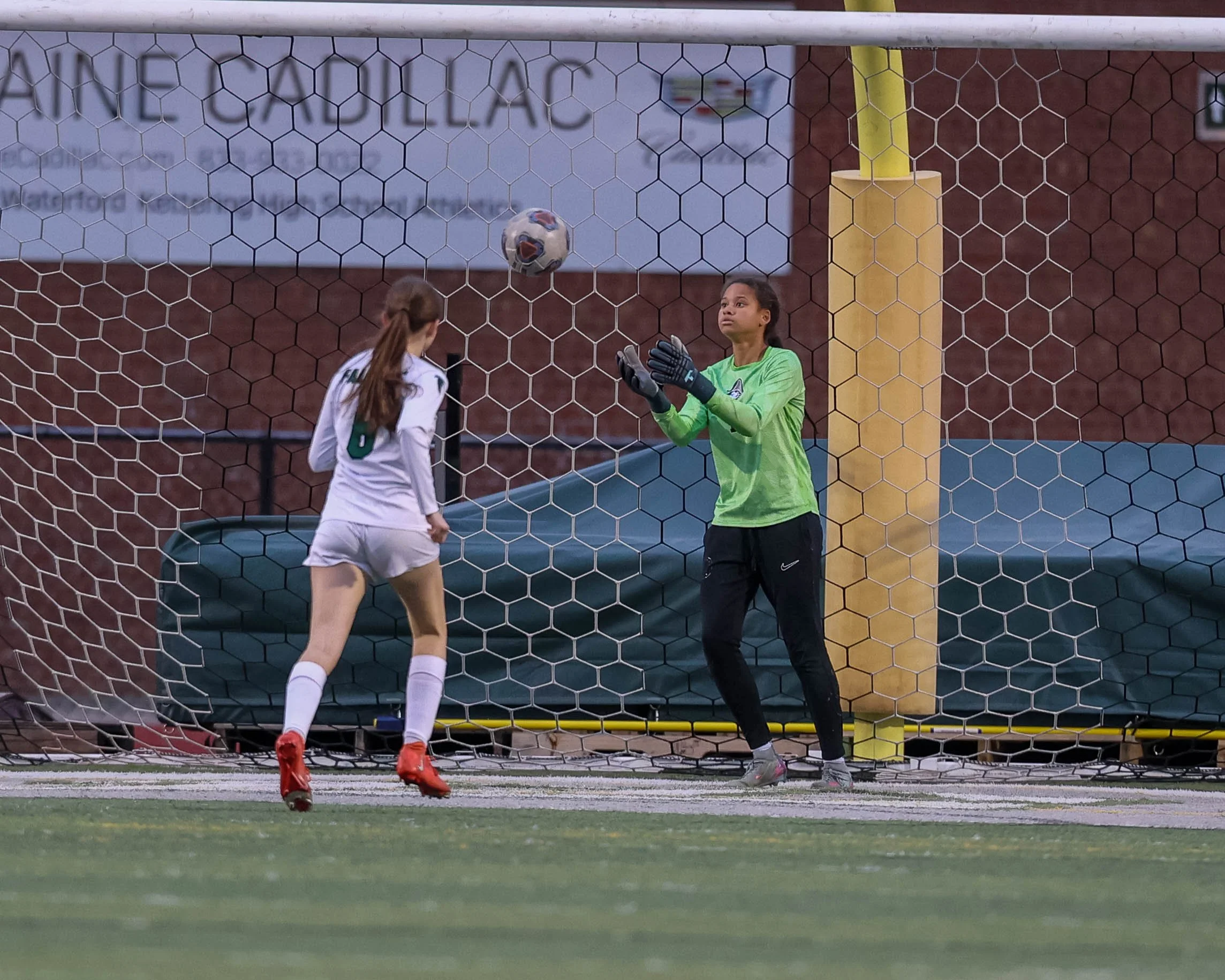 Kettering goalie catches the ball