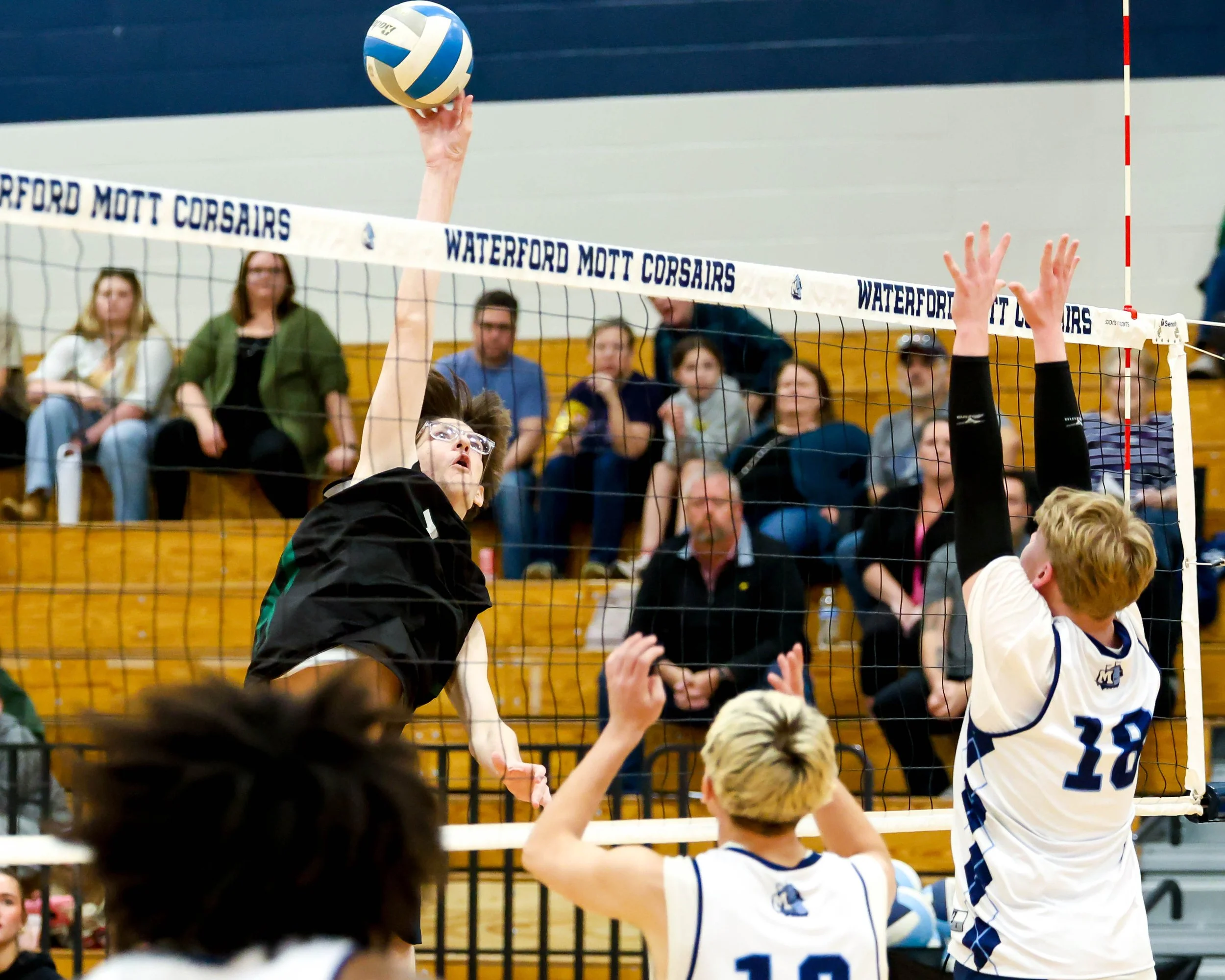 Kettering #7 spikes the ball