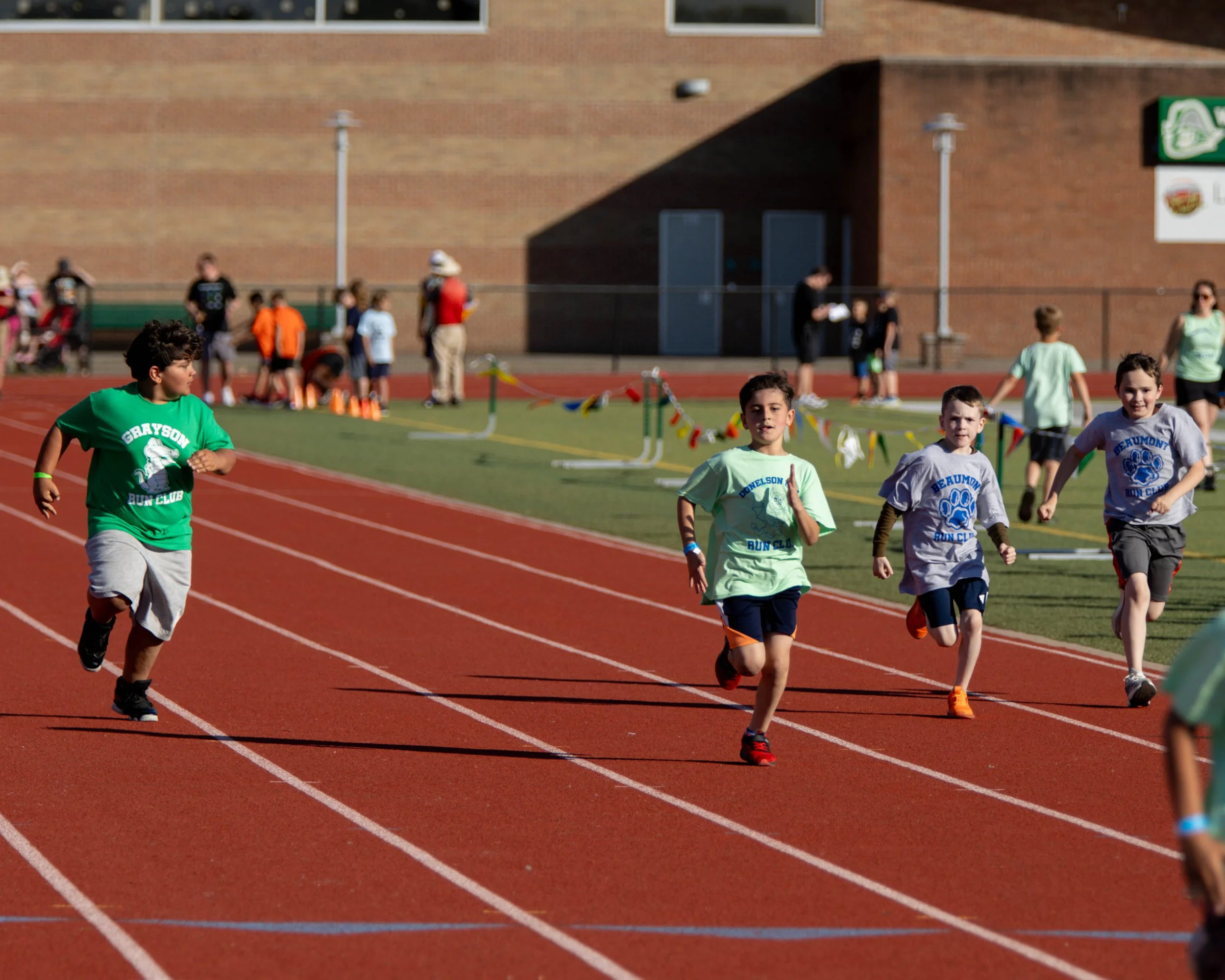 Grayson, Donelson, and Grayson boys finish the race