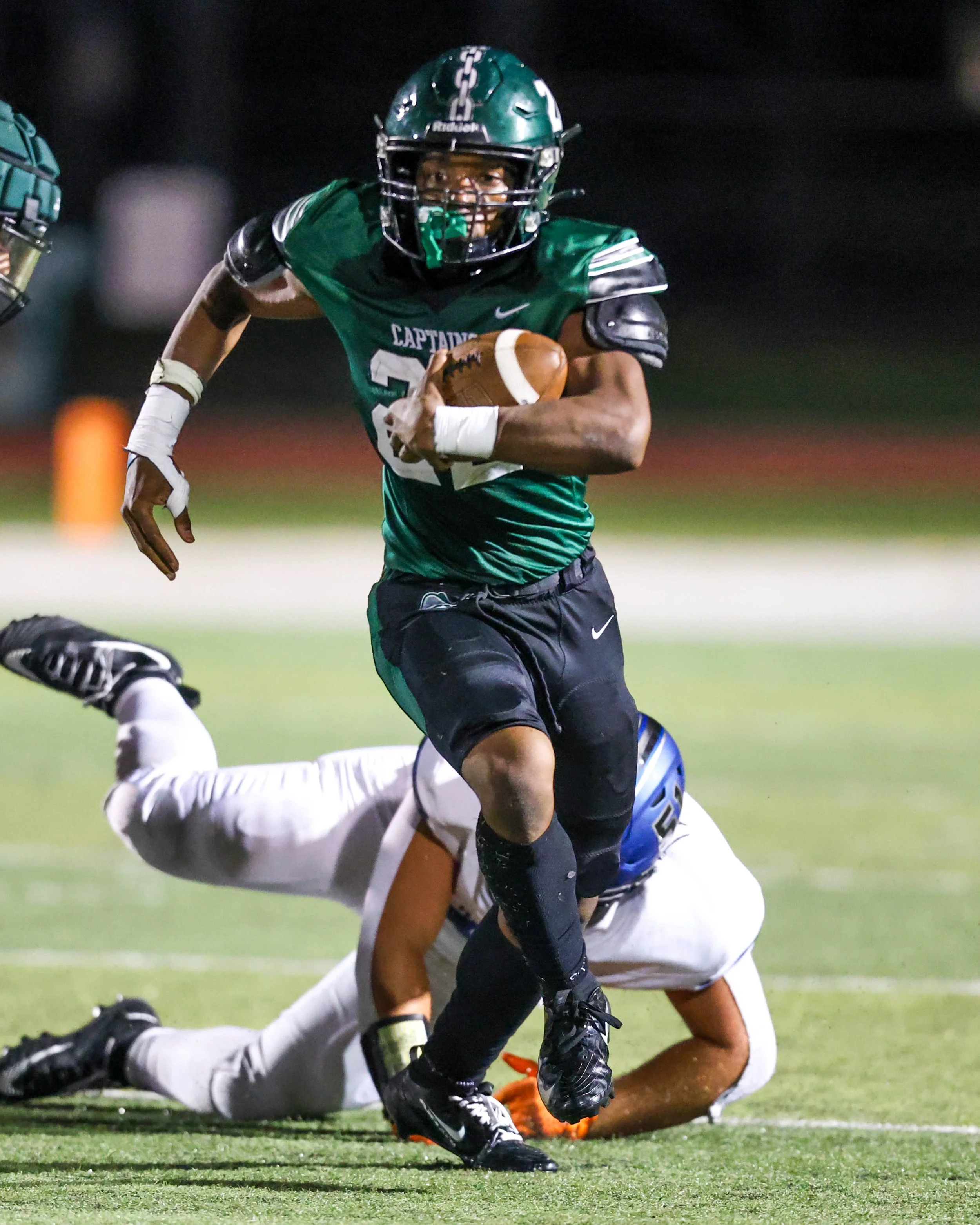WK #22 breaks a tackle
