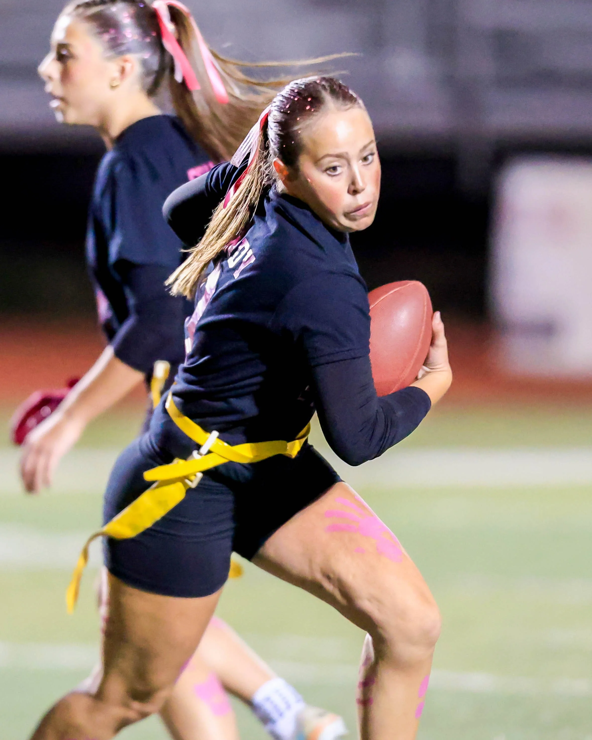Senior quarterback running with the ball