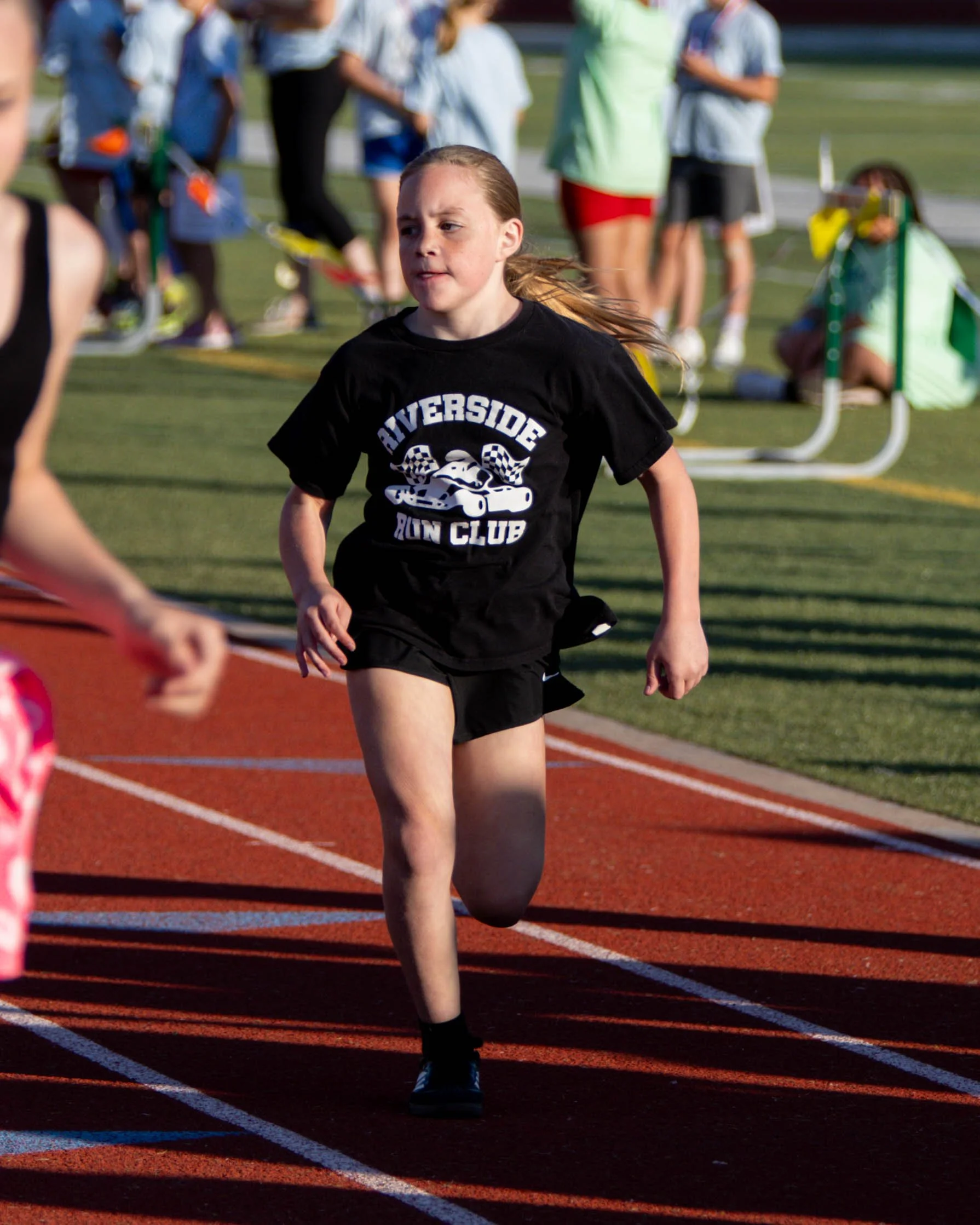 Riverside runner at the finish line