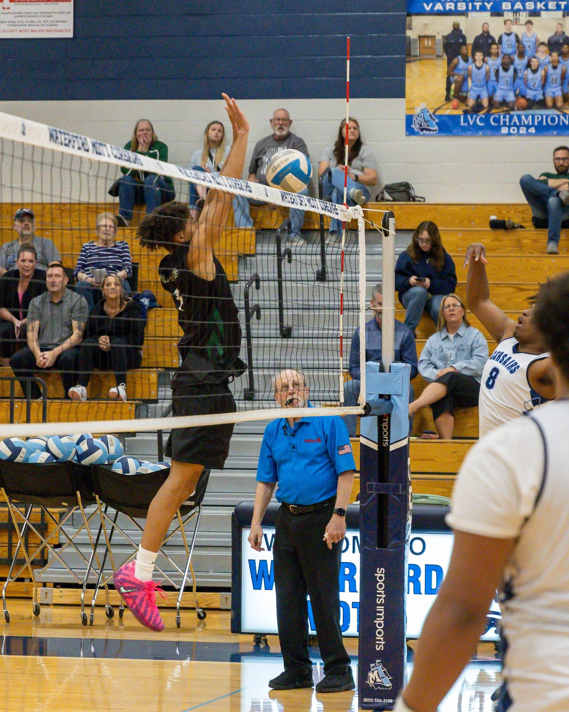 Kettering #1 blocks the ball