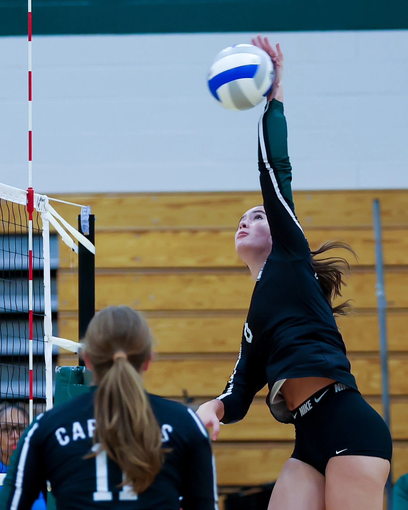 WK #6 spikes the ball