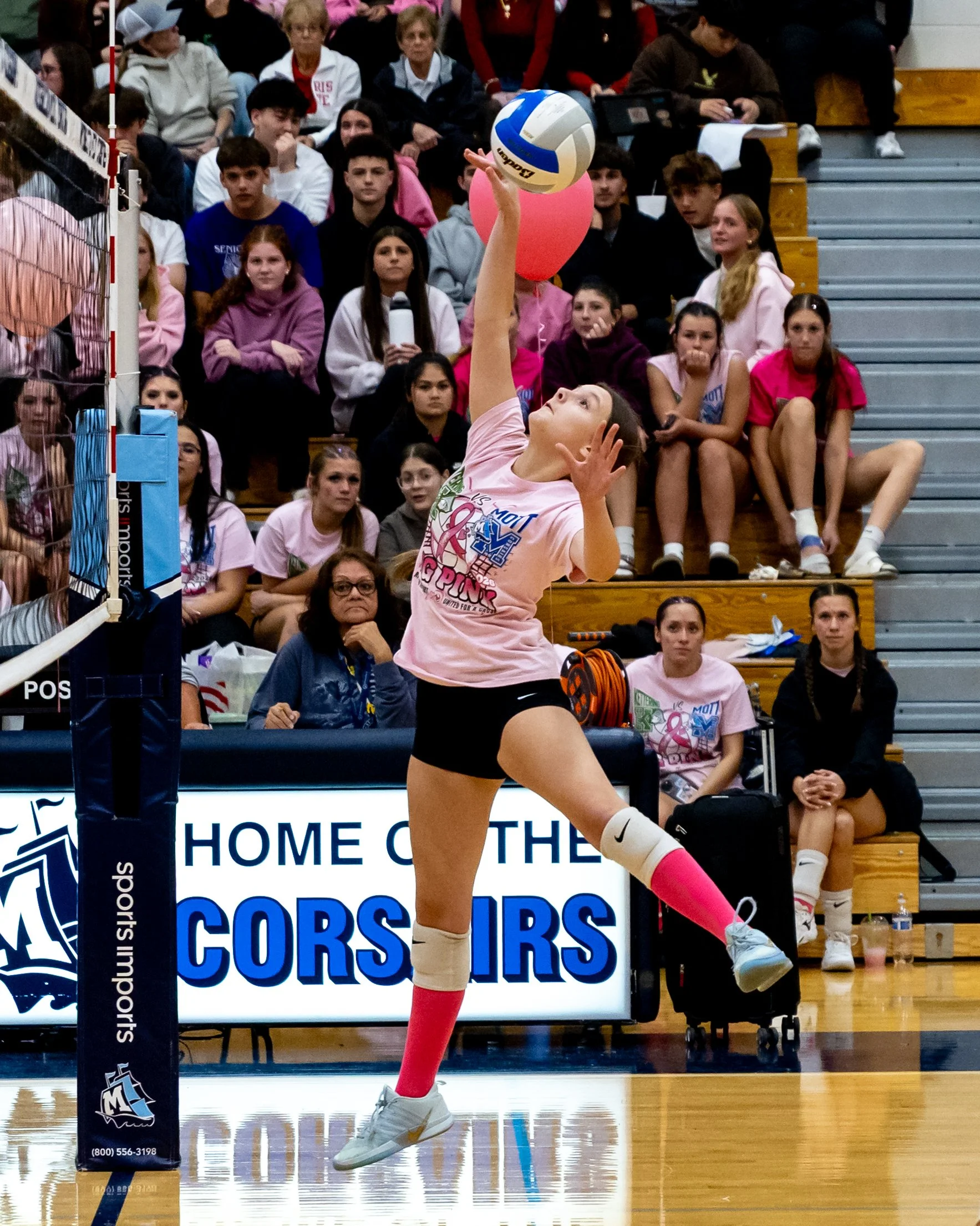 Mott player hits the ball