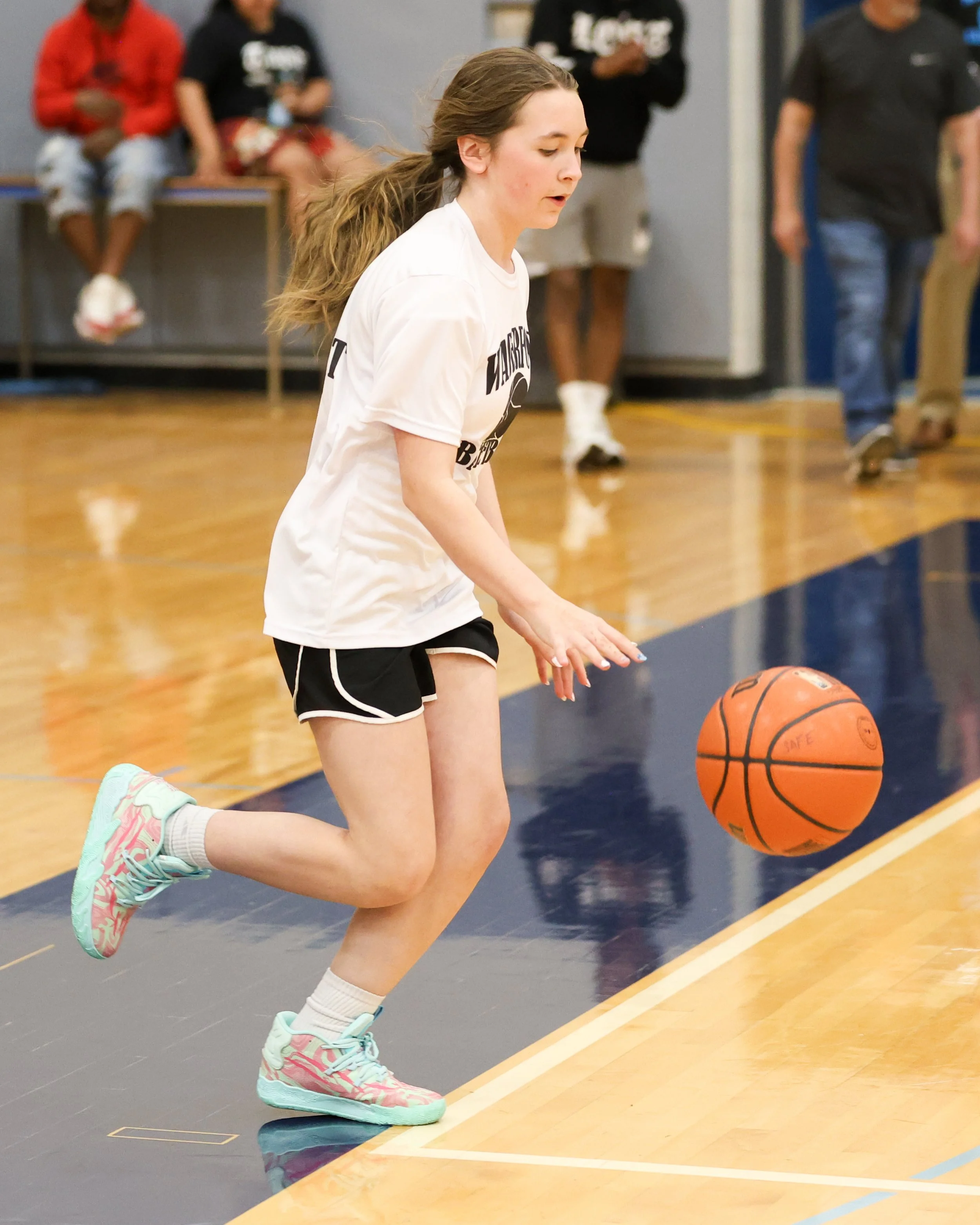 Beaumont girl dribbles the ball