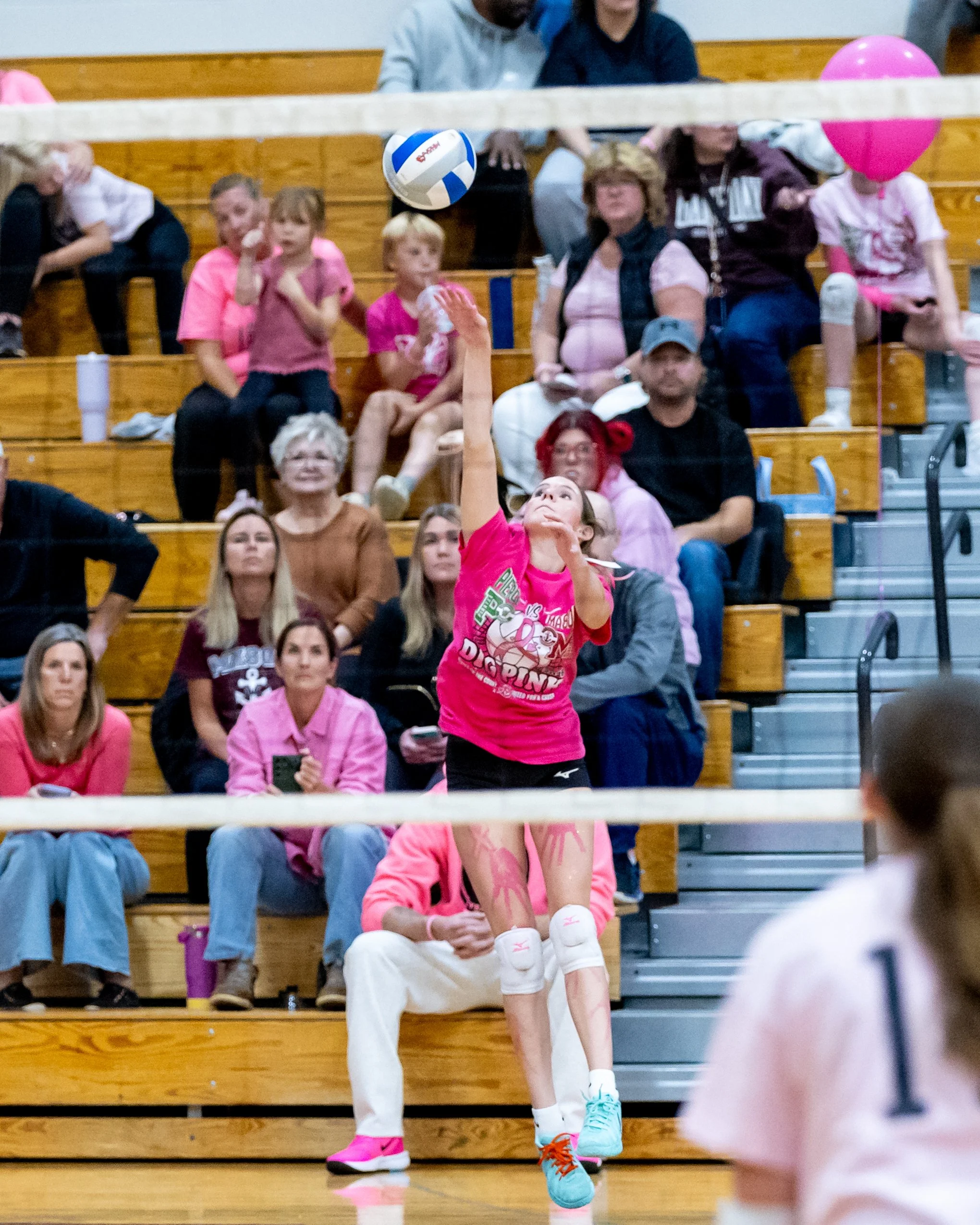 Pierce player serves the ball
