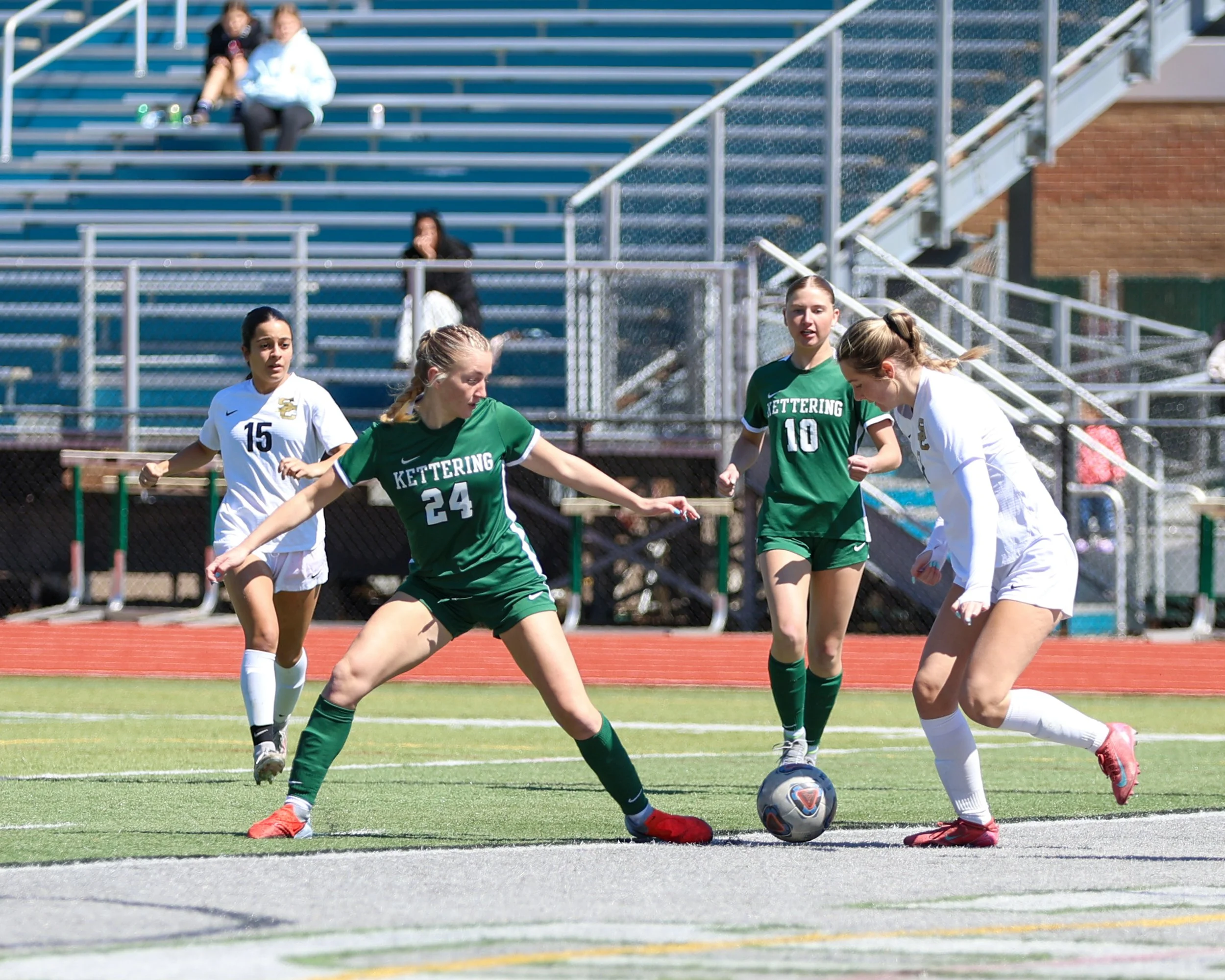 #24 battles for the ball