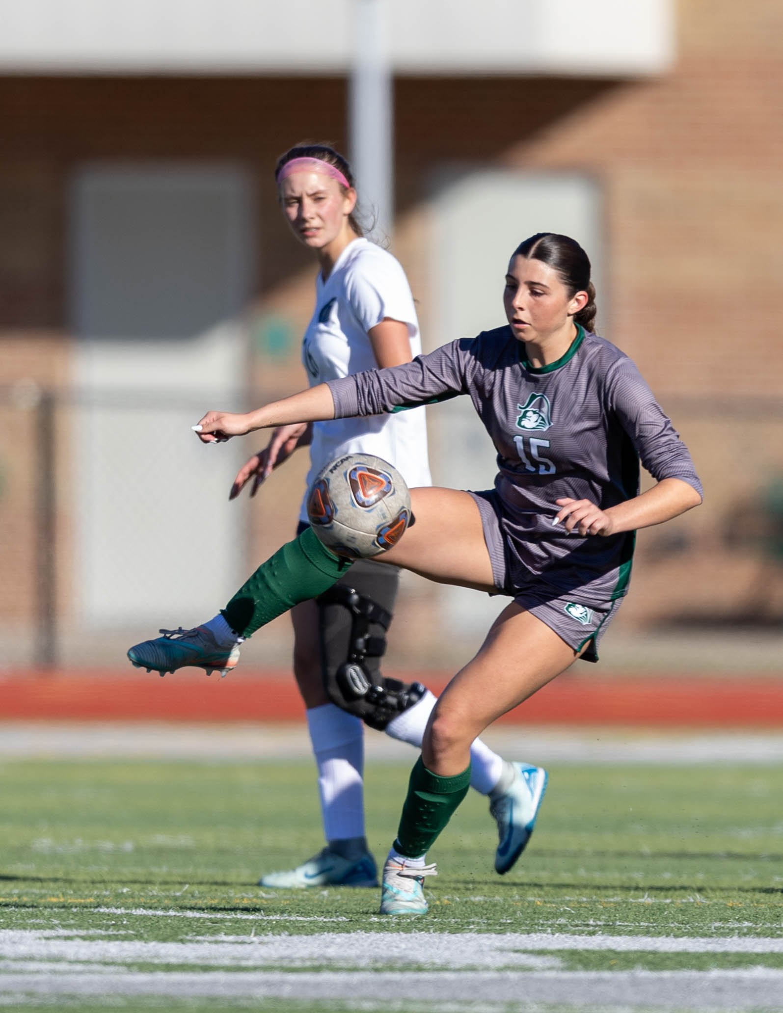 #15 passes the ball