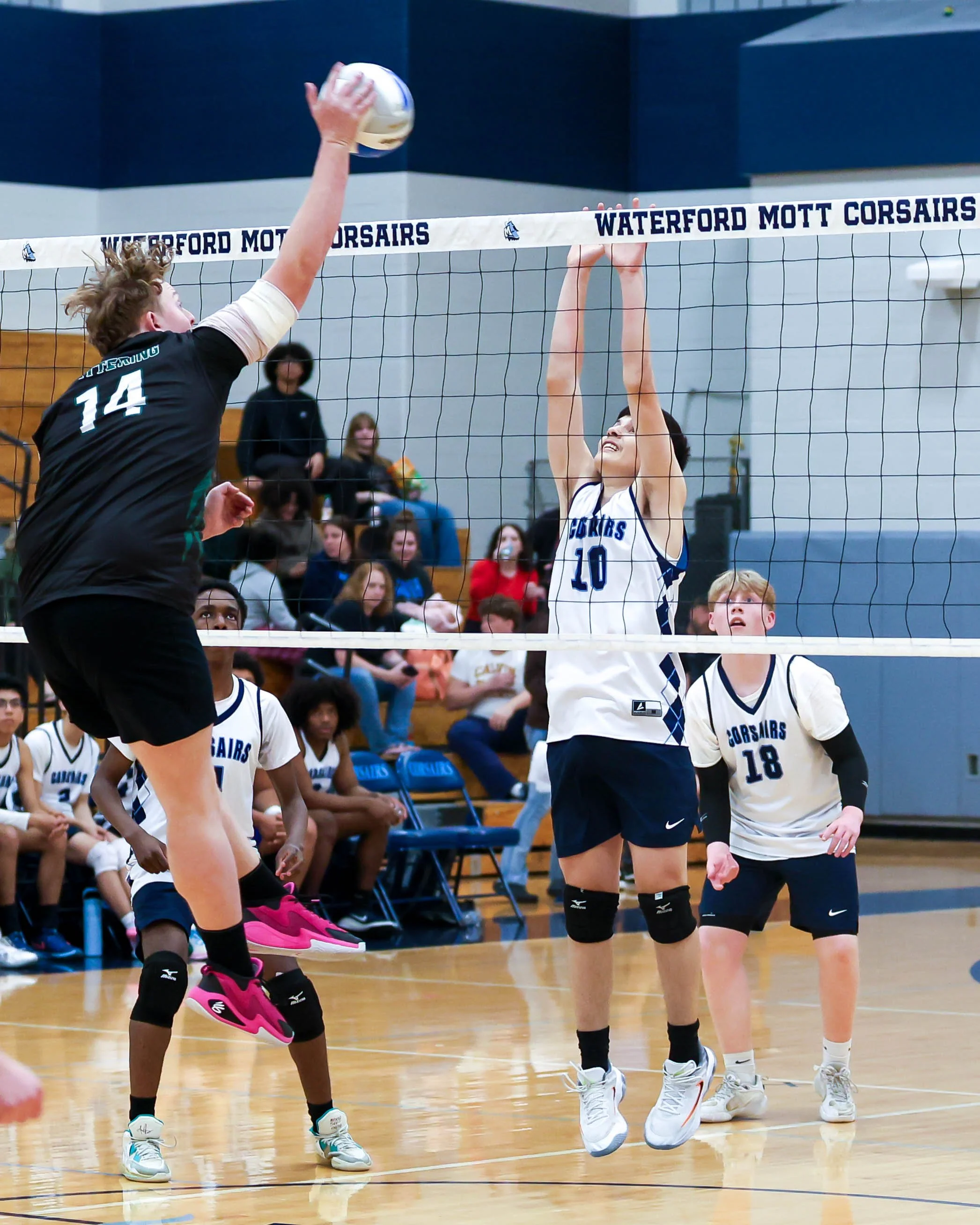 Kettering #14 spikes the ball