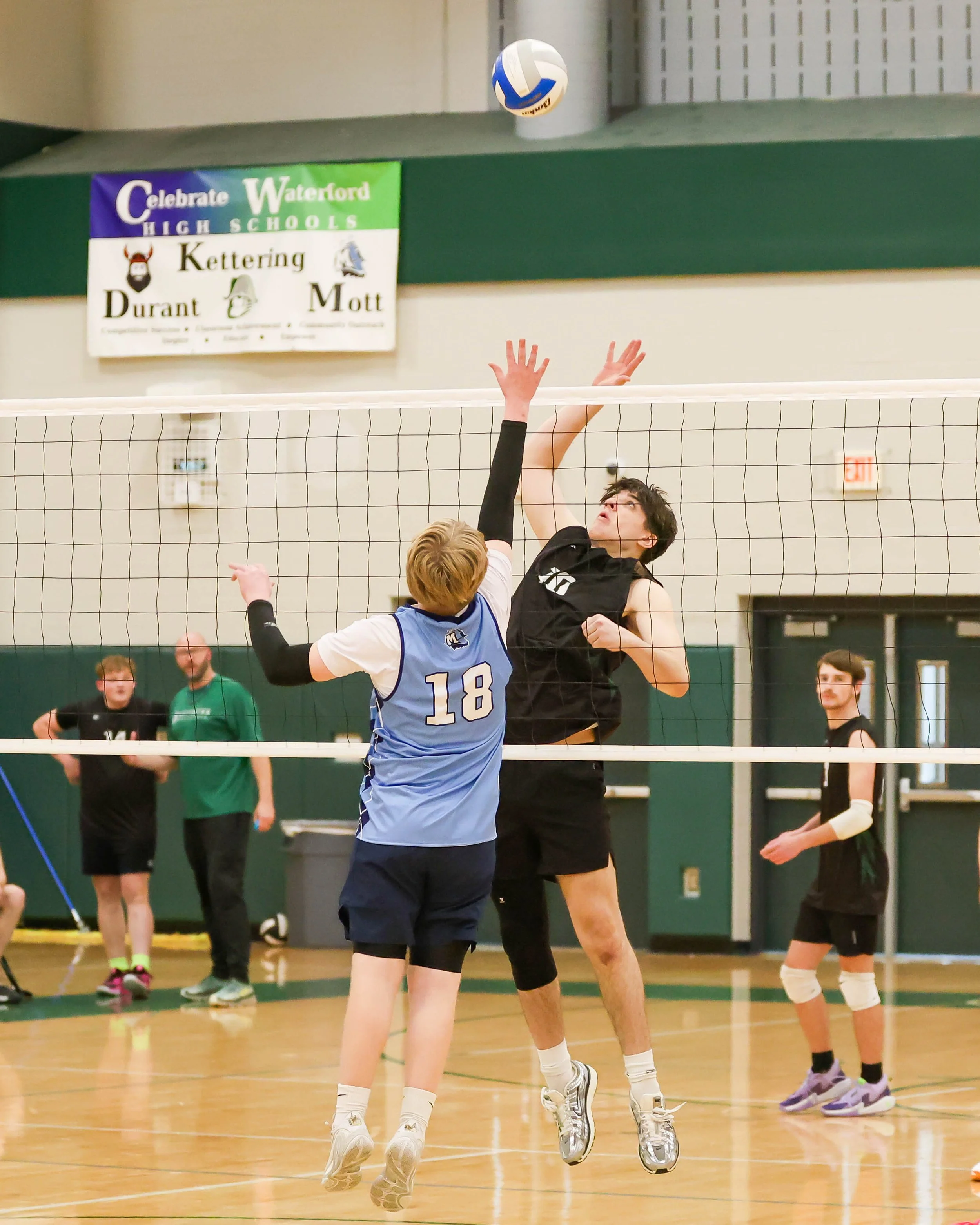 Kettering #10 waits to spike the ball