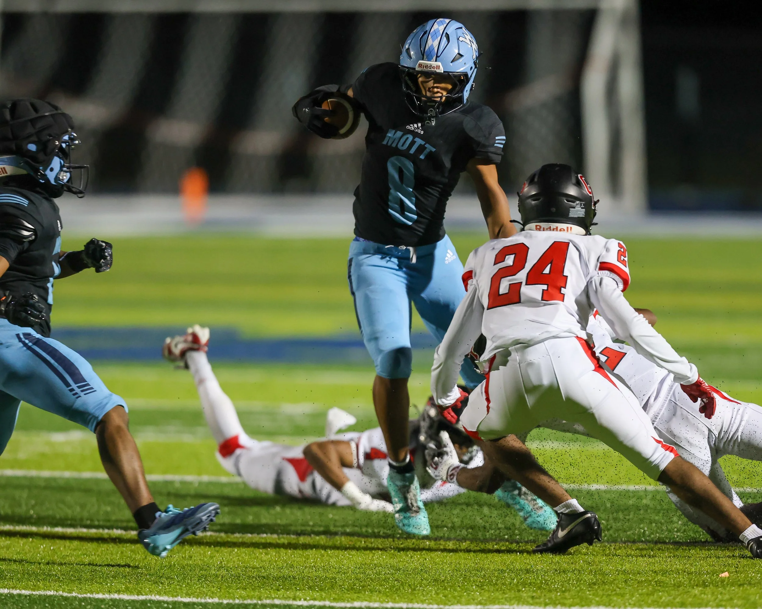 WM #8] eludes the Oak Park defense