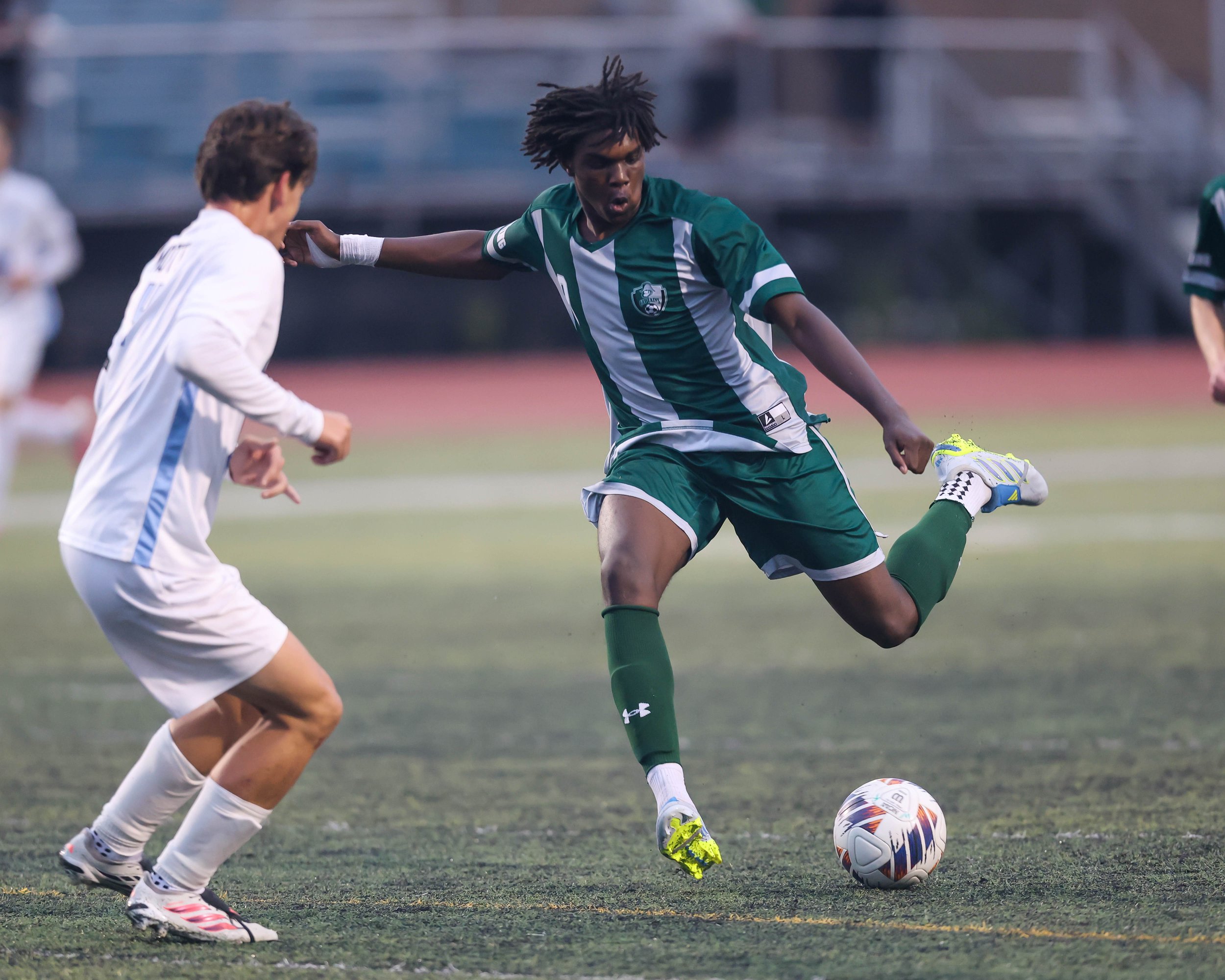 WK # 9 shoots the ball