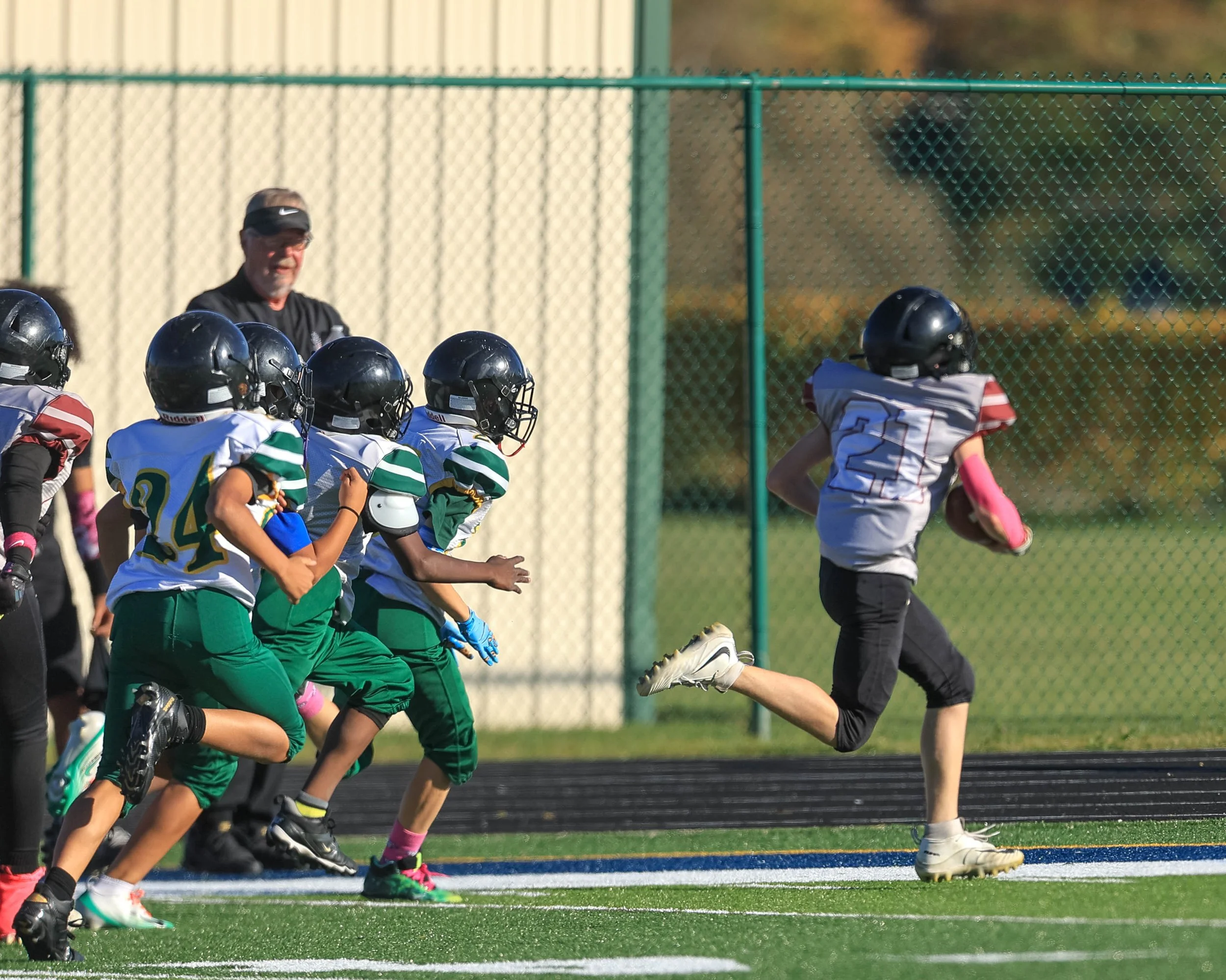 Mason #21 heads for the end zone