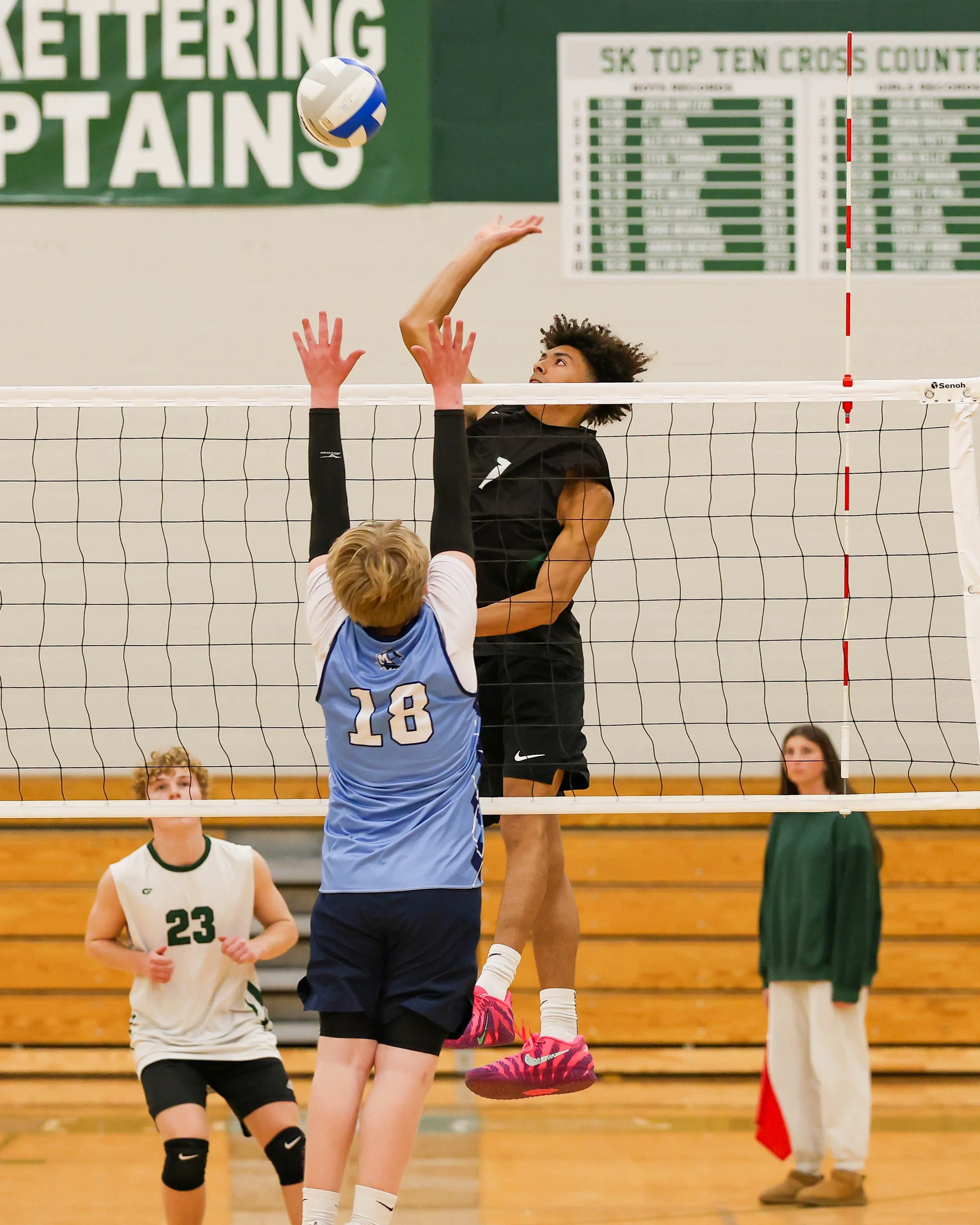 Kettering #1 spikes the ball
