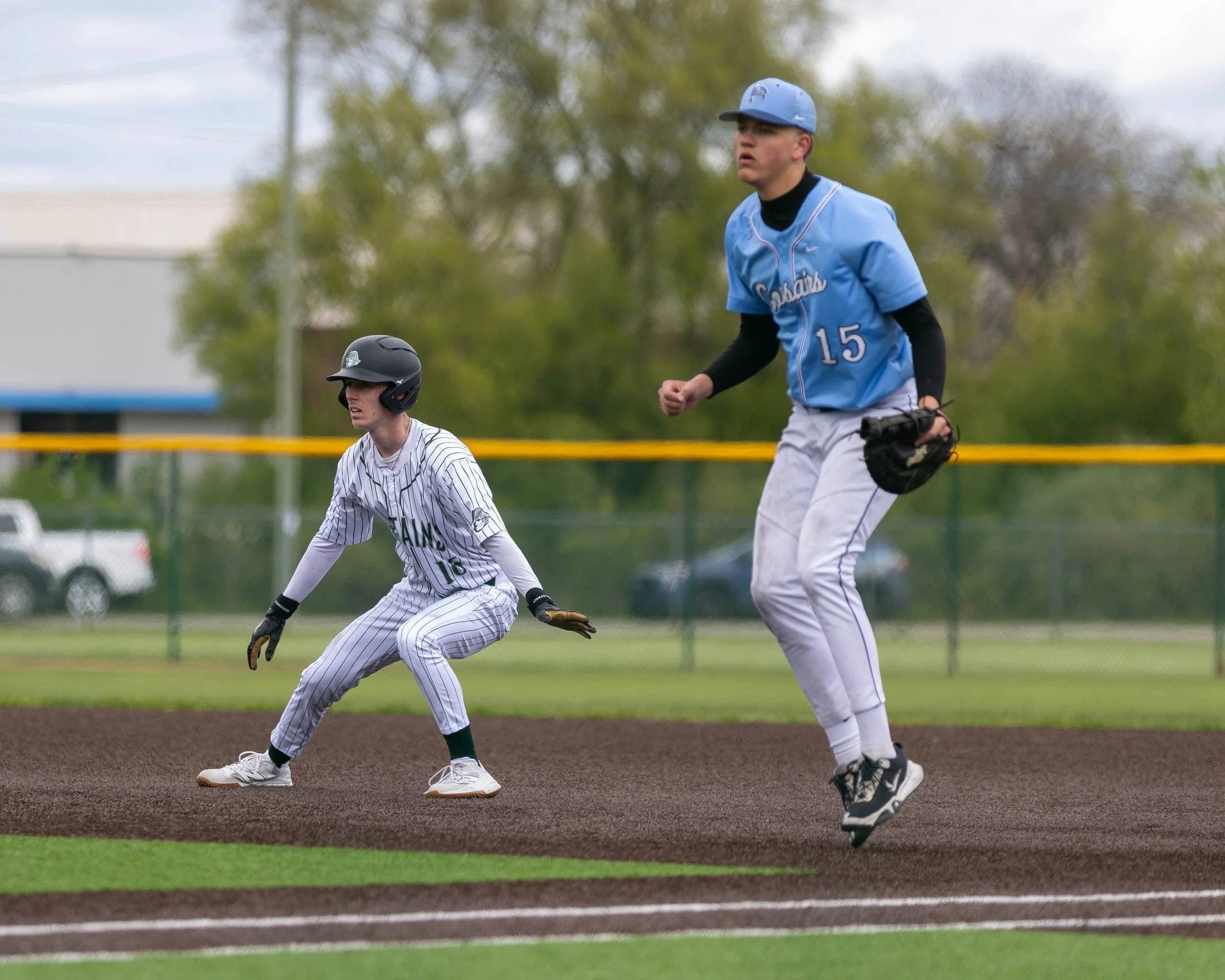Kettering #16 leads off at 1st base
