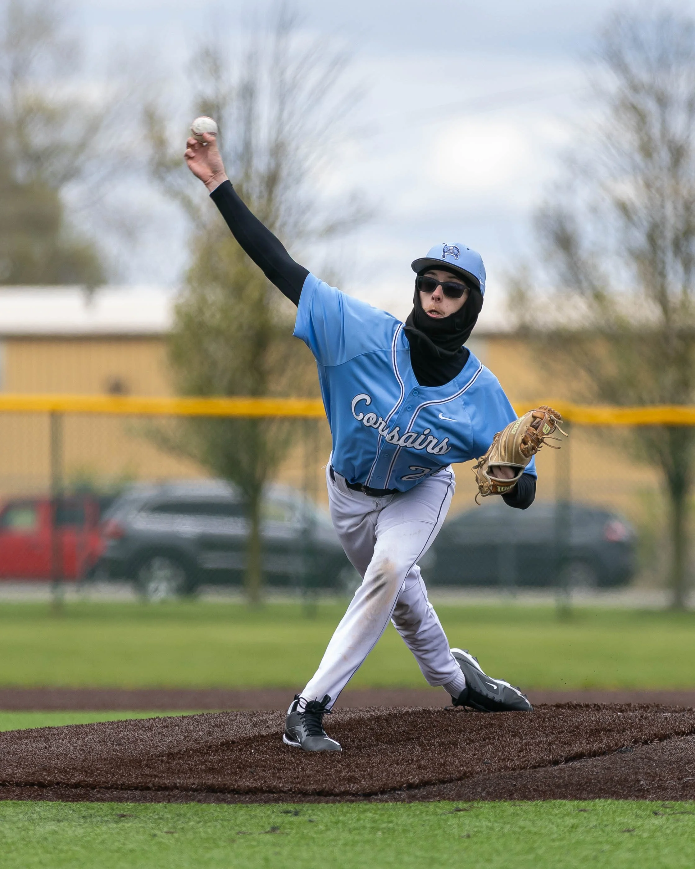 Mott #2 pitches the ball
