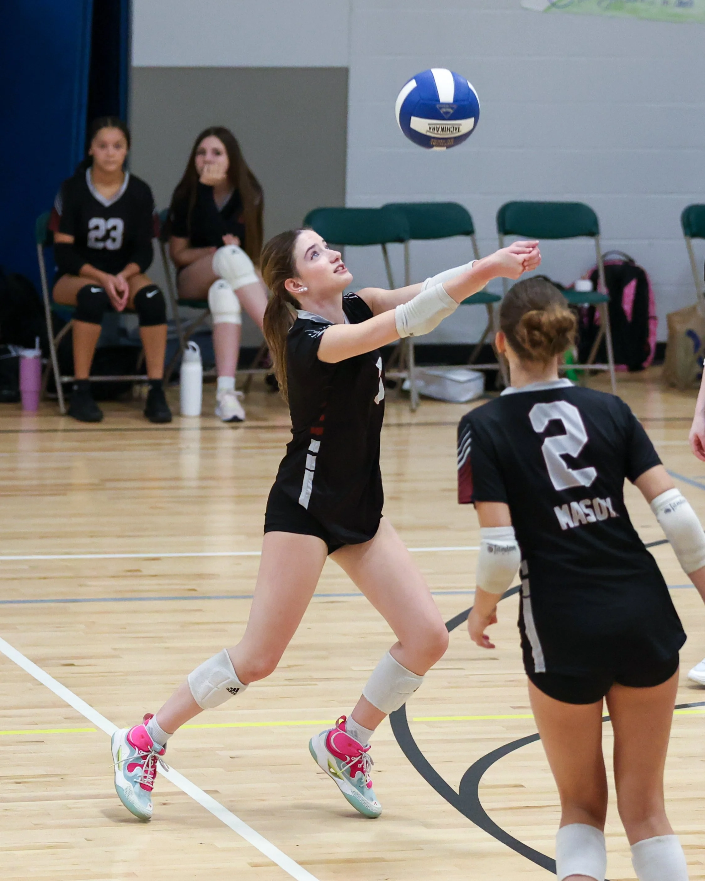 Mason girl returns the ball