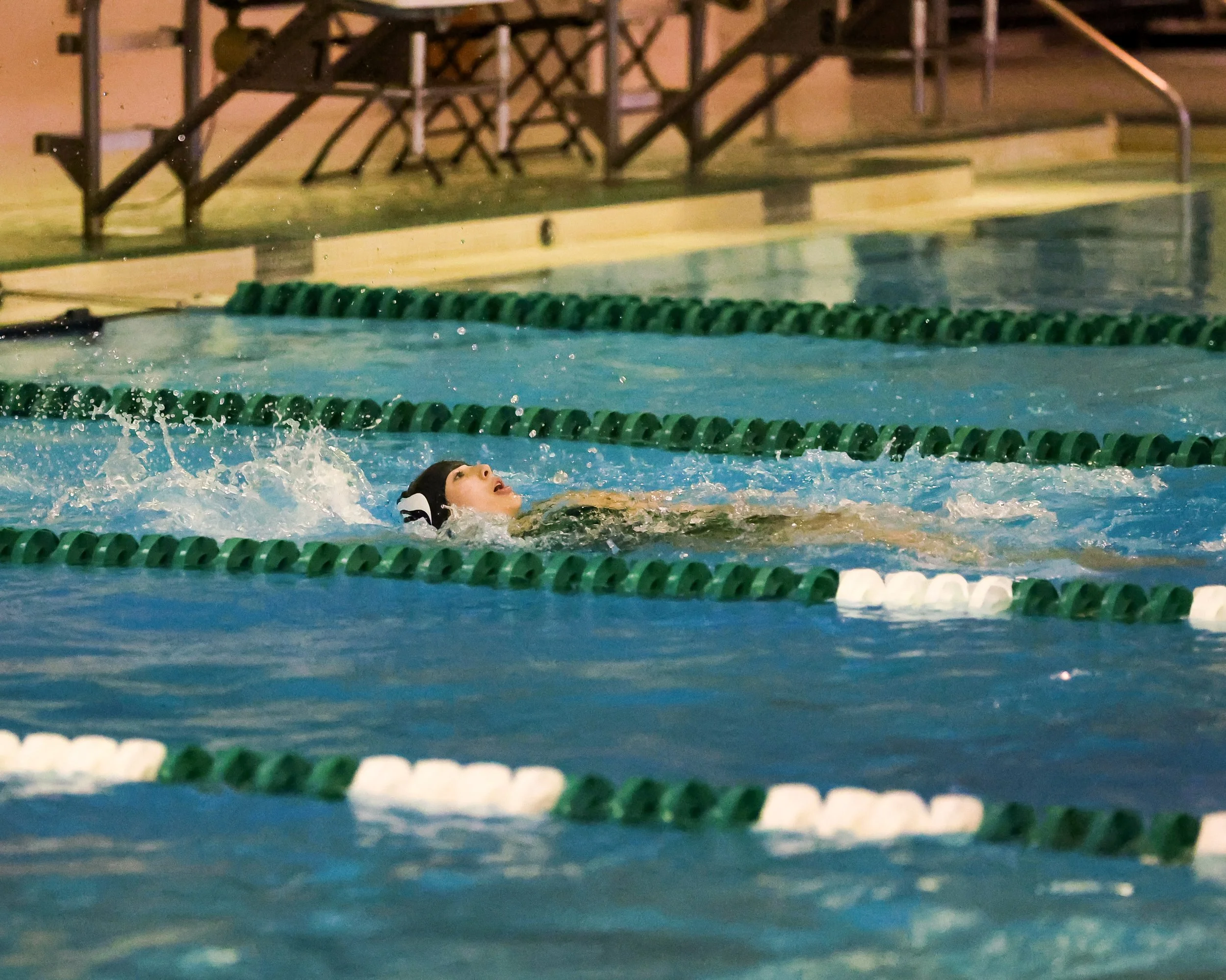 WU swimmer doing the backstroke