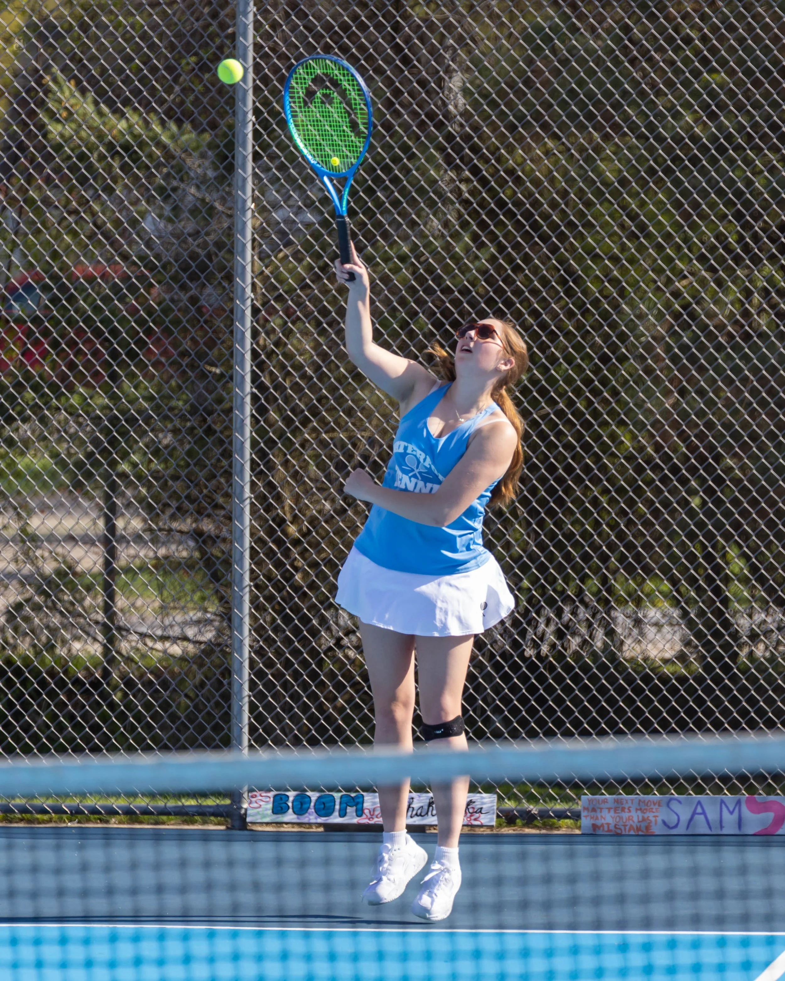 Waterford United player serves the ball